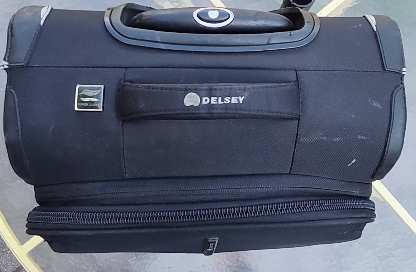Delsey carry on luggage with telescopic pull handle