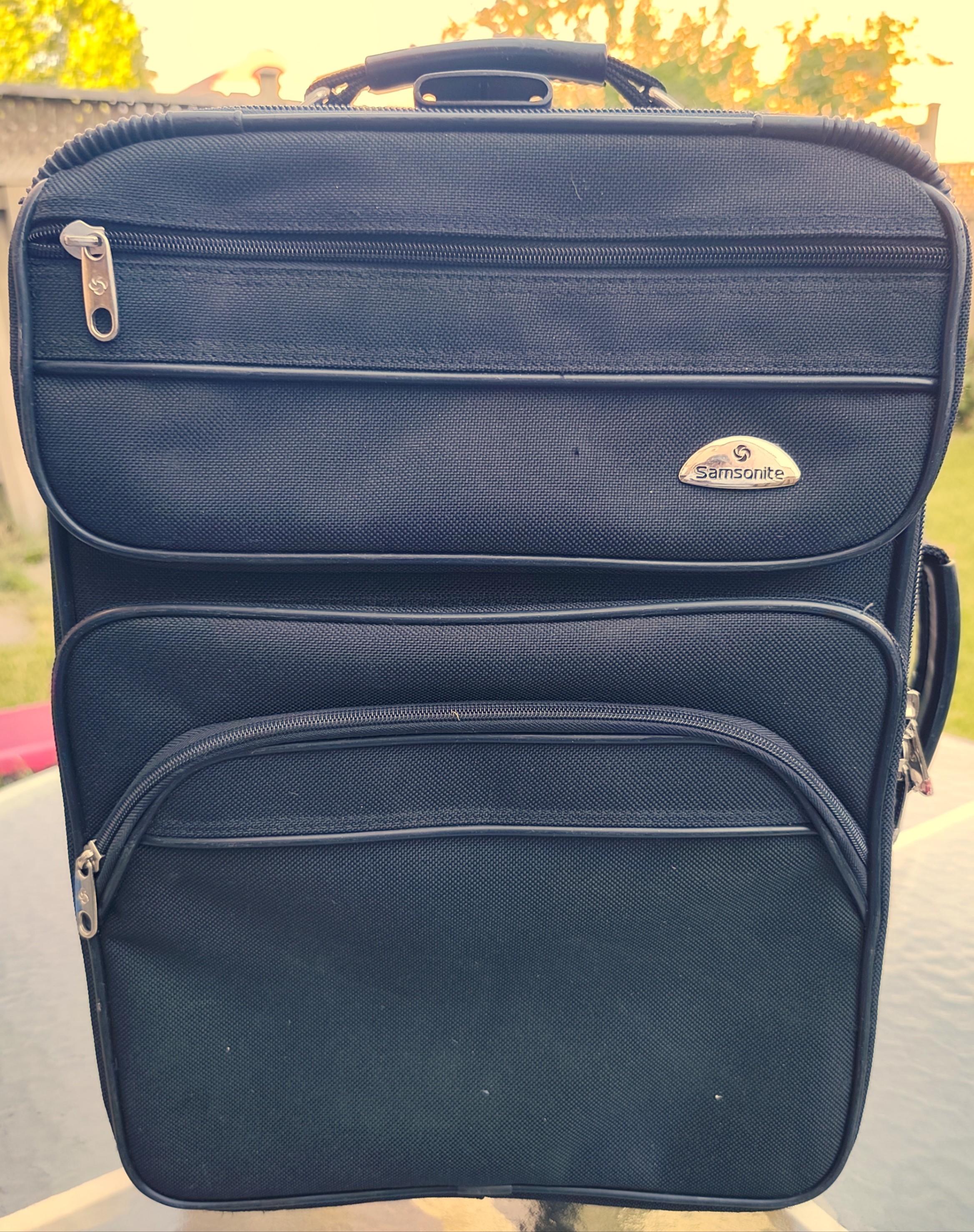 Samsonite carry on luggage with telescopic pull handle