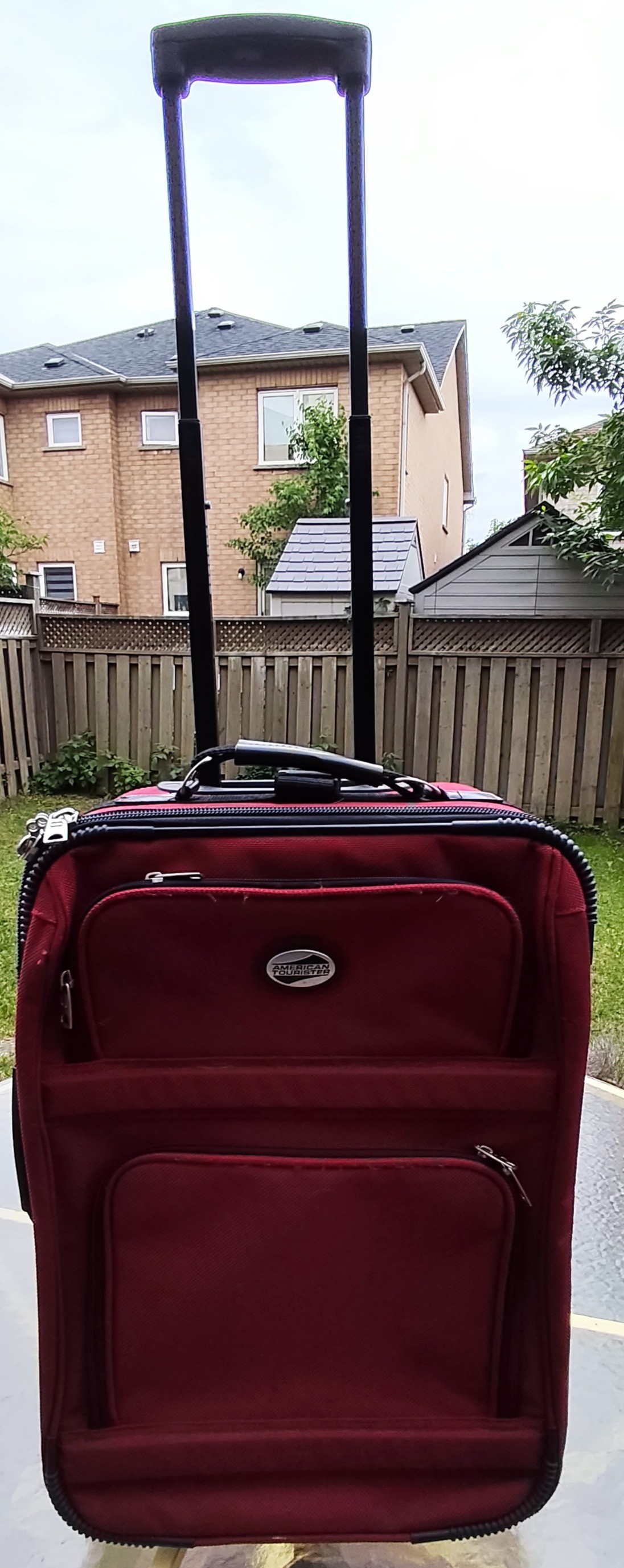 American Tourister carry on luggage with telescopic pull handle - photo 5