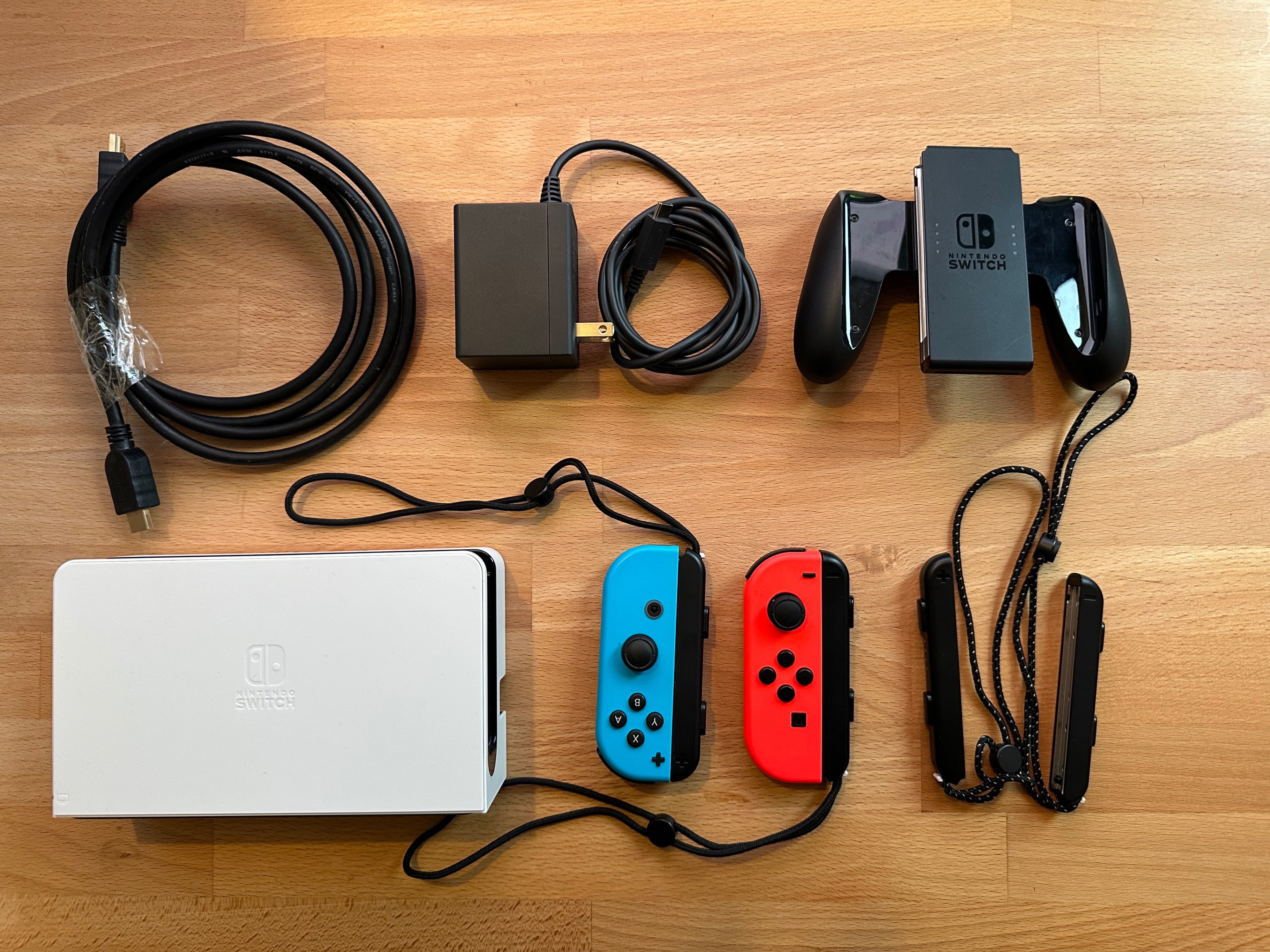 Nintendo Switch OLED White Bundle – 4 Joy-Cons, 3 Games, 2 Cases - photo 2
