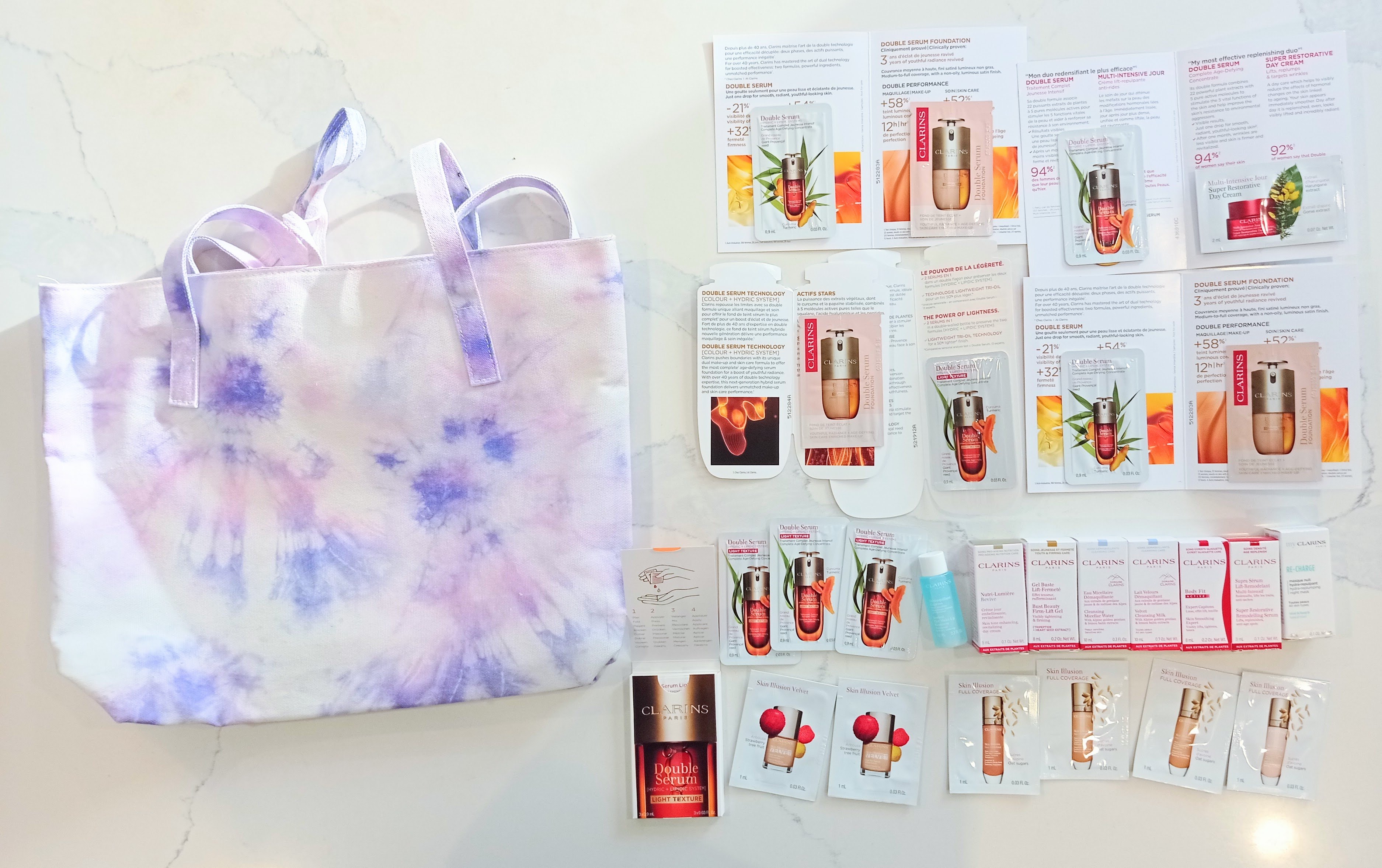 Huge Clarins Luxury Beauty Sample Bundle + Tie-Dye Tote Bag