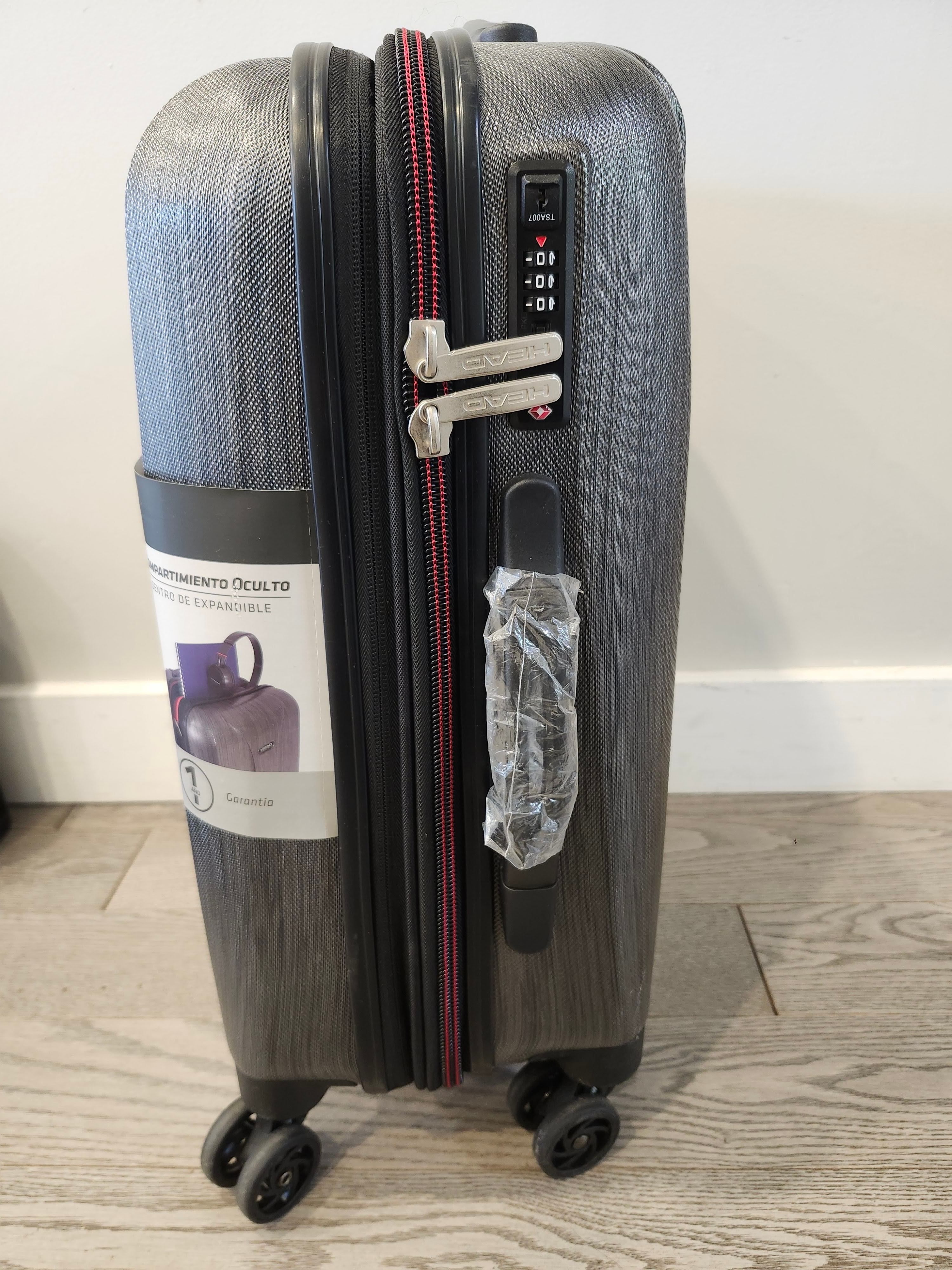 Like New HEAD Hard Shell Carry-On 4-Wheel Spinner Suitcase - photo 5