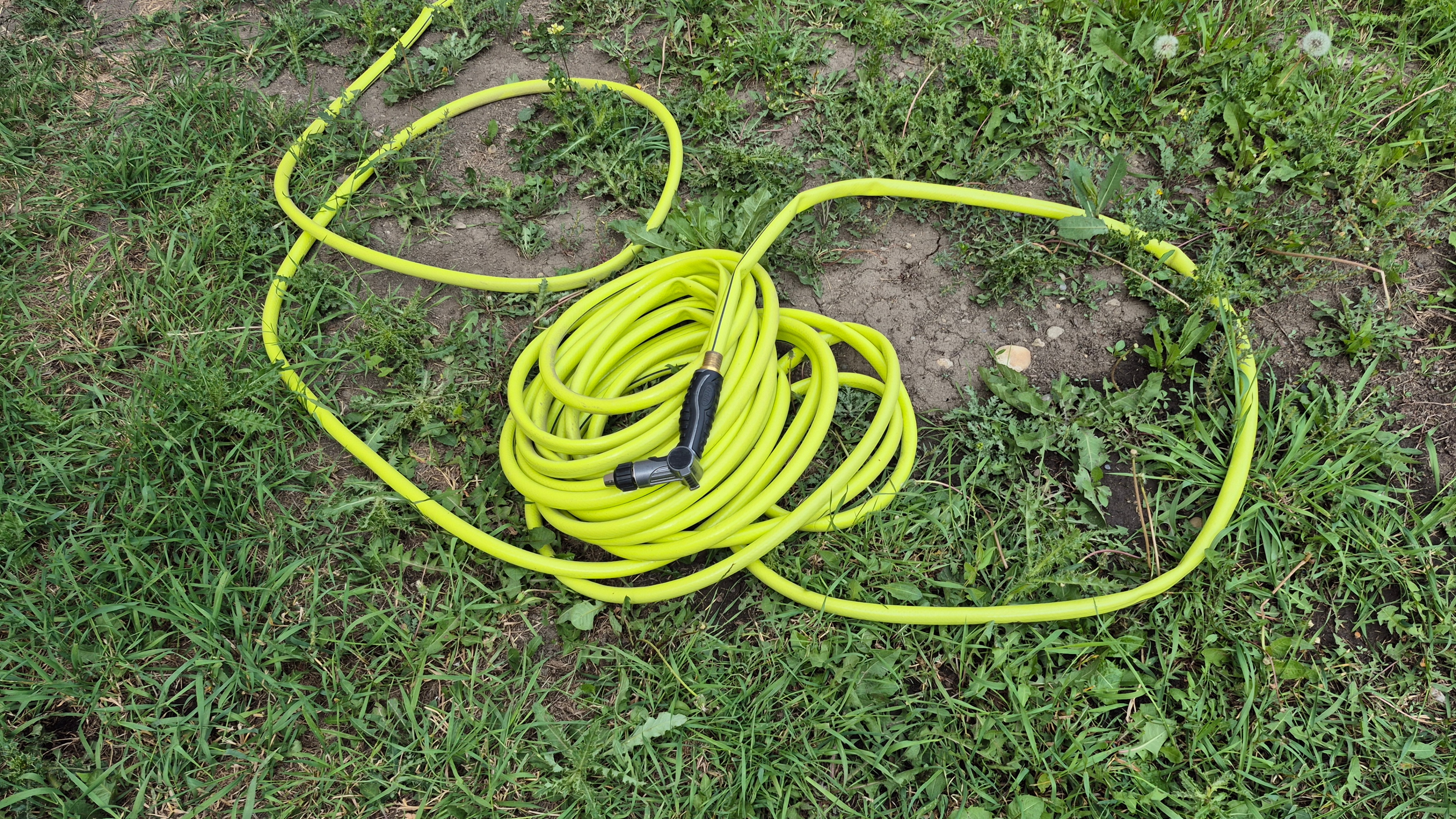 Yellow Garden Hose with Sprayer Nozzle