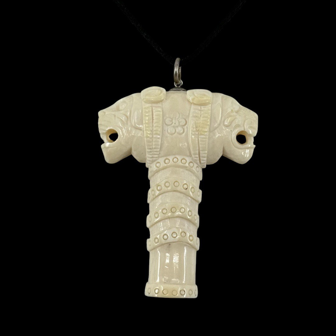 Vintage Mughal carved bone double lion head seal pendant