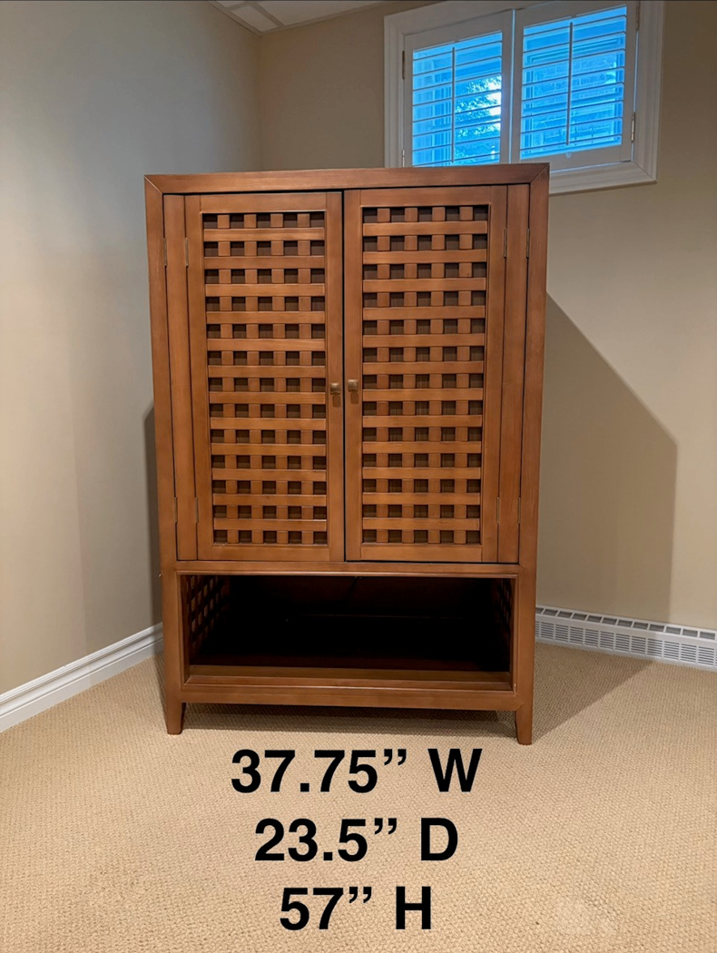Two wooden cabinets with lattice doors