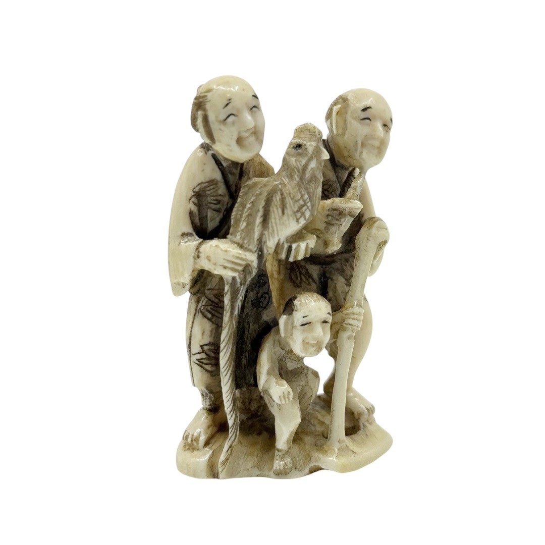 Showa period Japanese farmers and a kid carved Ivory netsuke