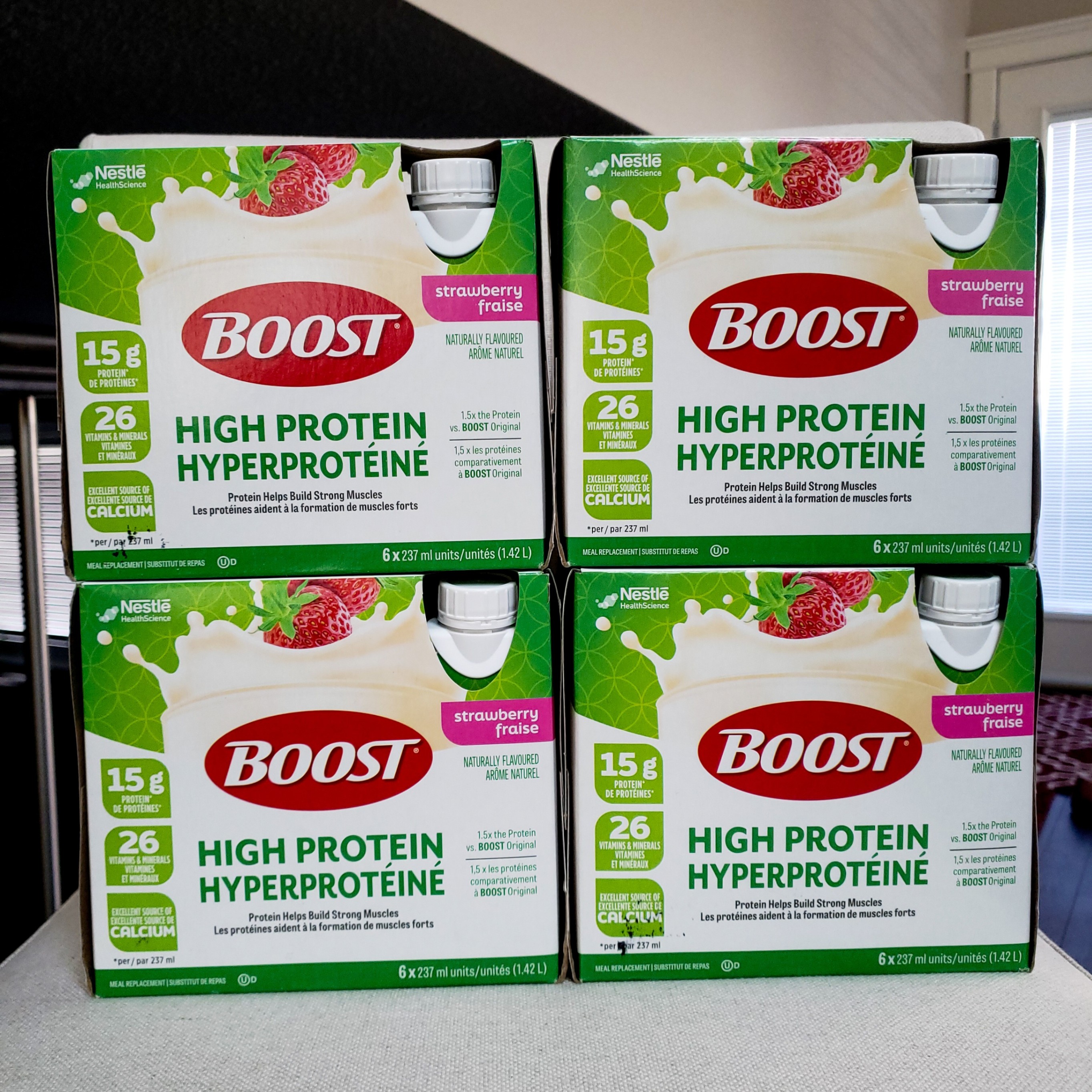 4 Boxes of BOOST High Protein Drinks (Strawberry or Chocolate) - photo 2
