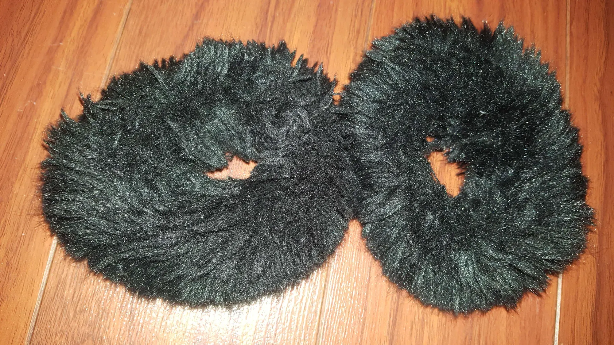 furry wrist cuffs made of fuzzy black vegan faux fur