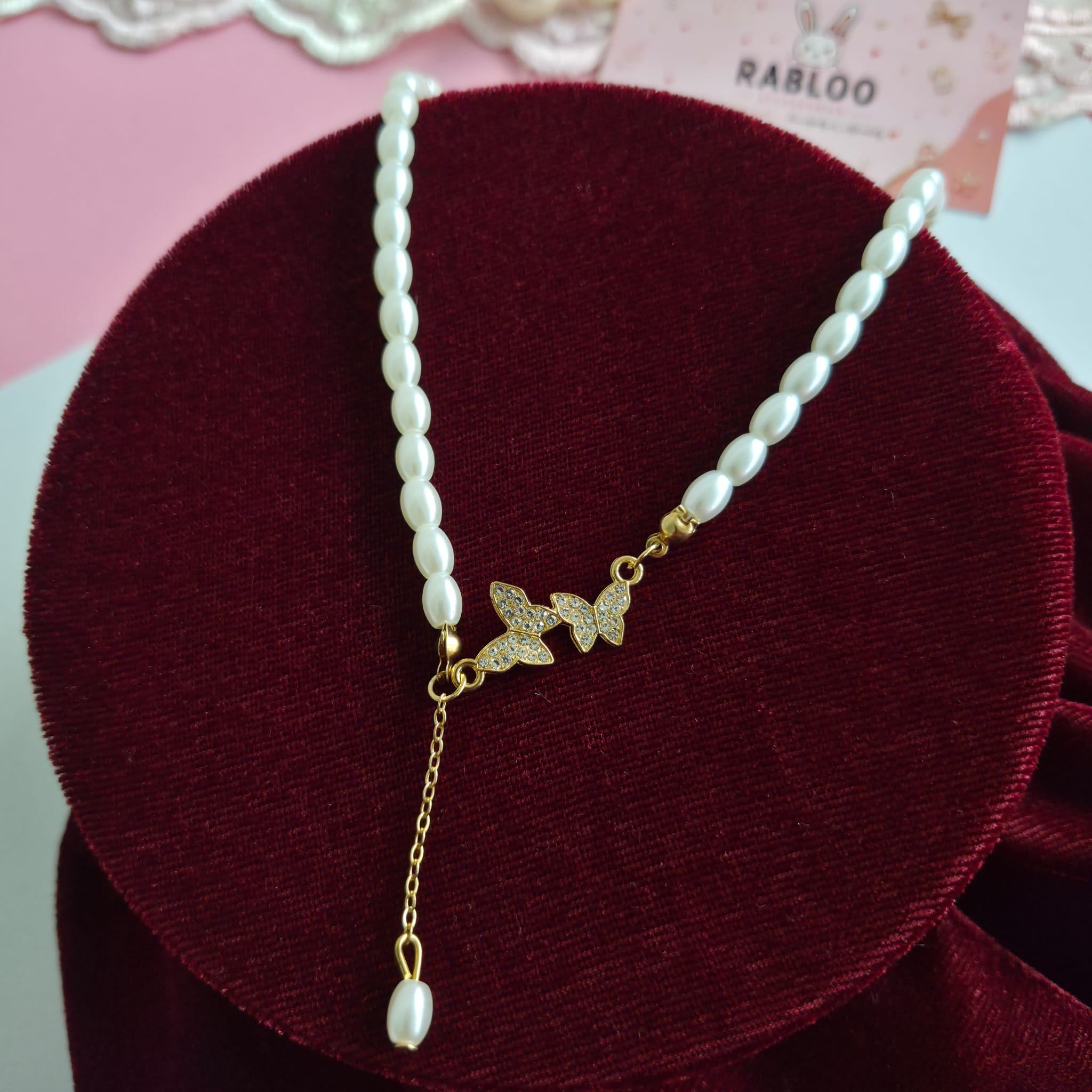 ✨ Pearl Butterfly Necklace by Rabloo Accessories