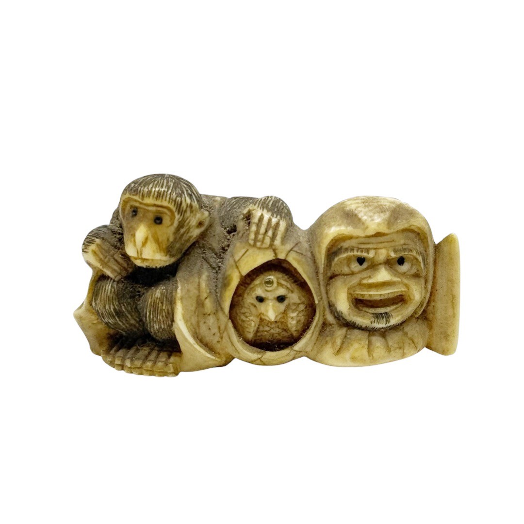 Showa period Japanese carved bone monkey chick & farmer figurine