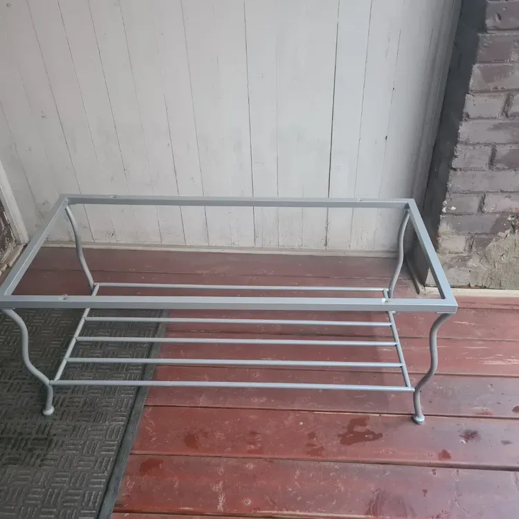 Aluminum coffee table without top.