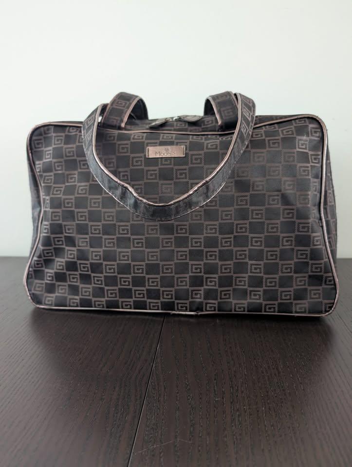 Modella handbag / purse , brown in color