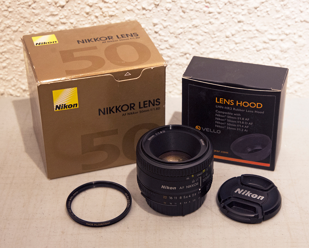 Nikon 50mm f/1.8 Lens (New + Filter & Hood)