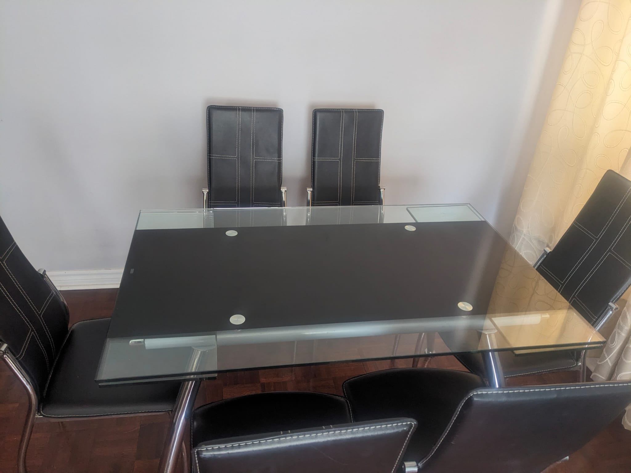 Tempered glass dining table with six chairs
