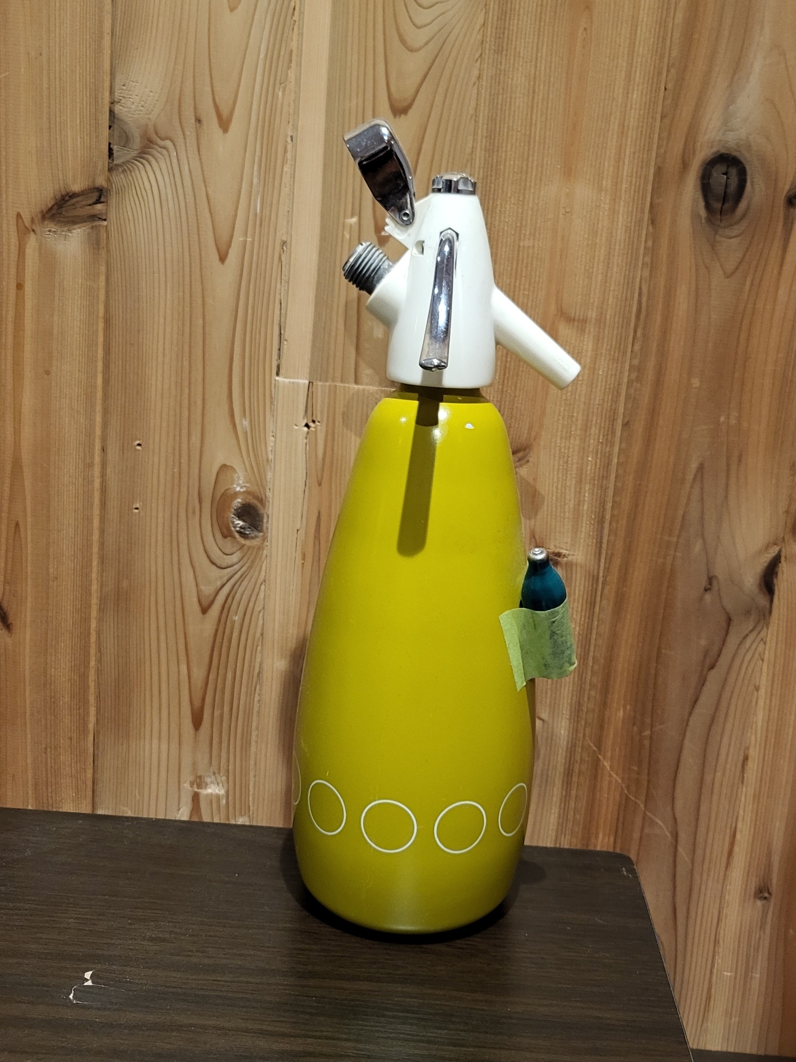 Vintage seltzer bottle in charteuse