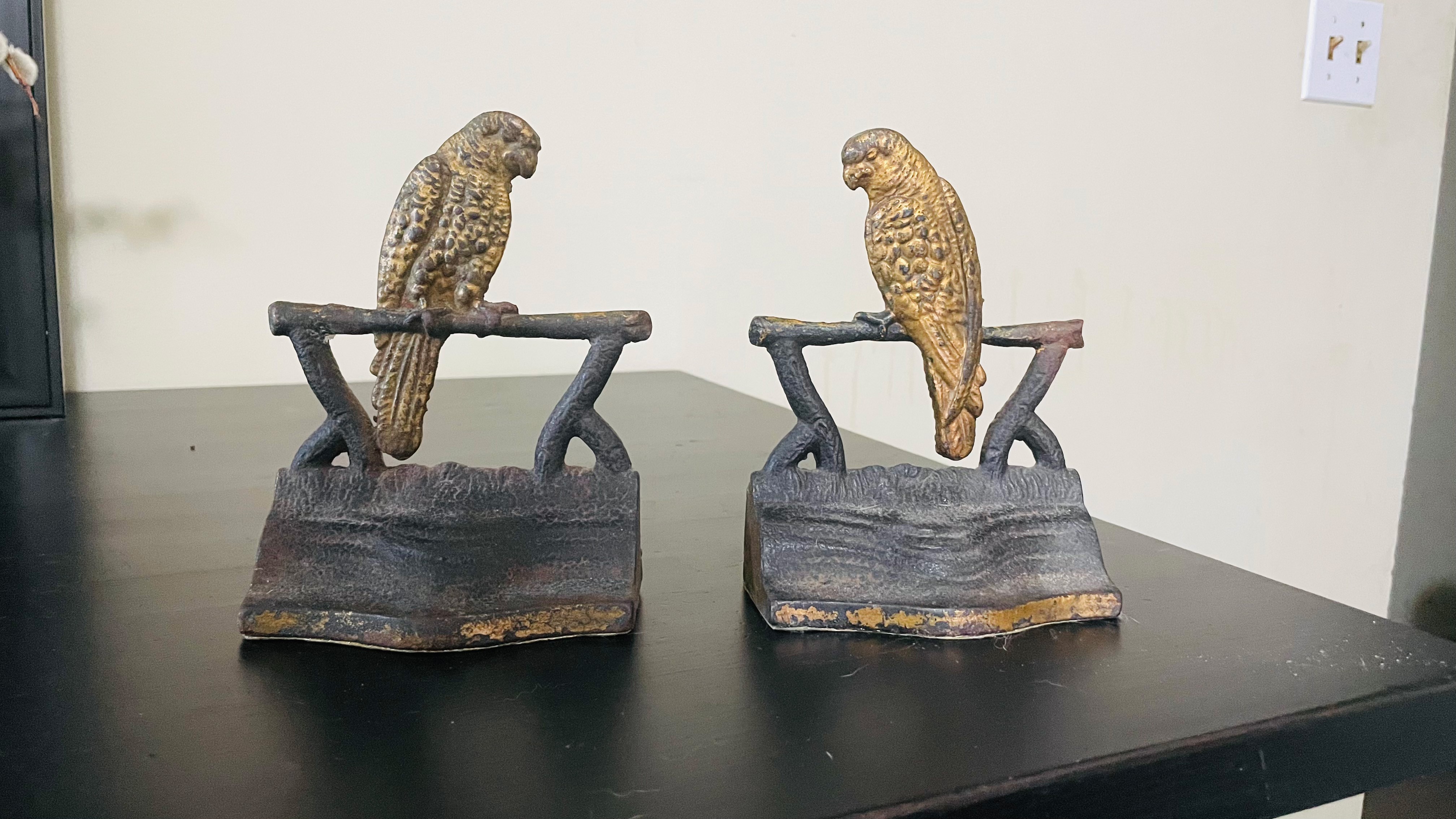 Antique cast iron parrot bookends. Circa 1920's