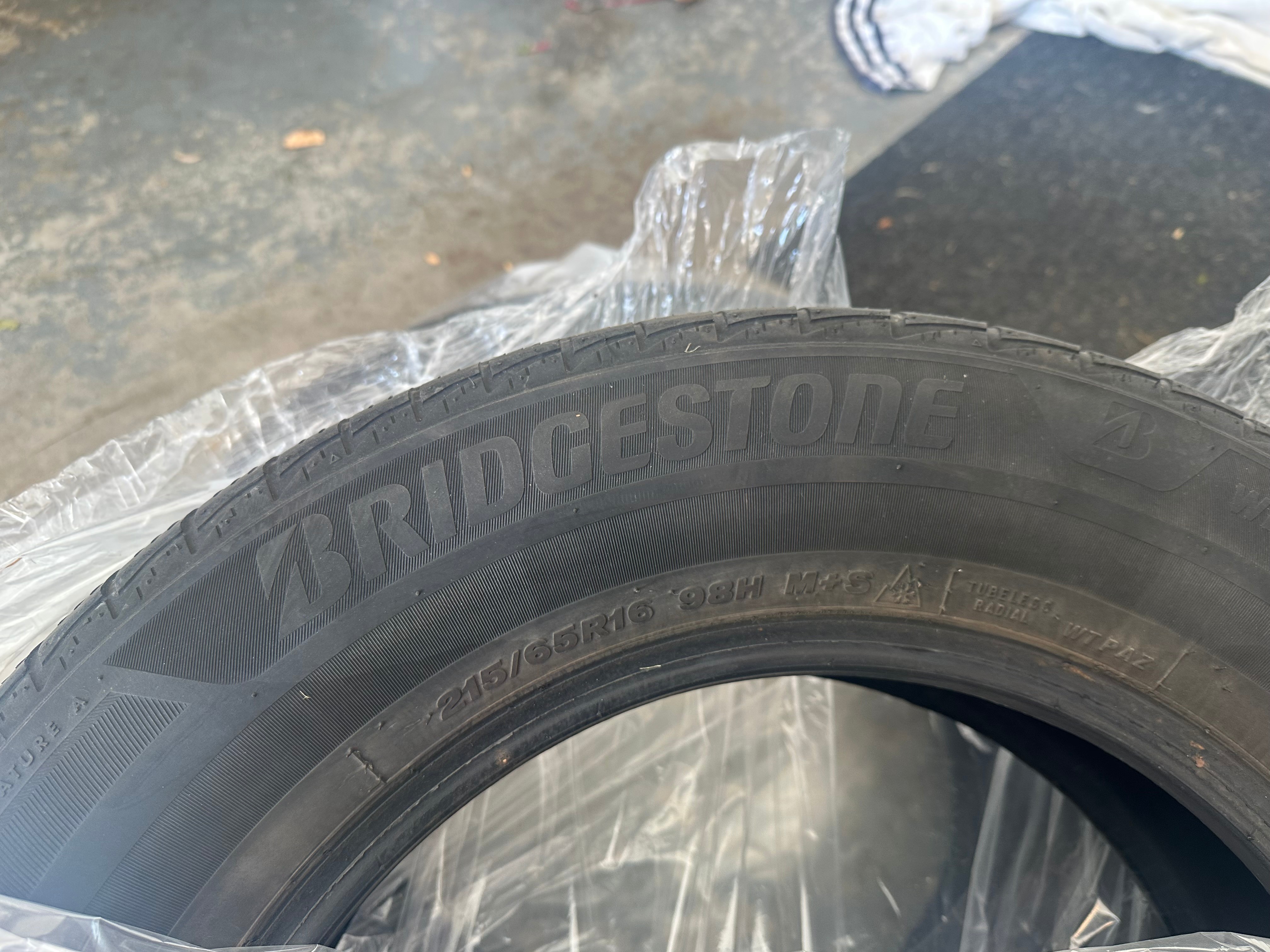 2 All Weather Bridgestone Tires – 215/65R16 98H M+S