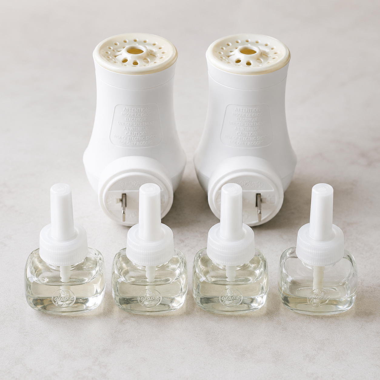 Glade Plug-In Scented Oil Warmers + Clean Linen Refills Bundle