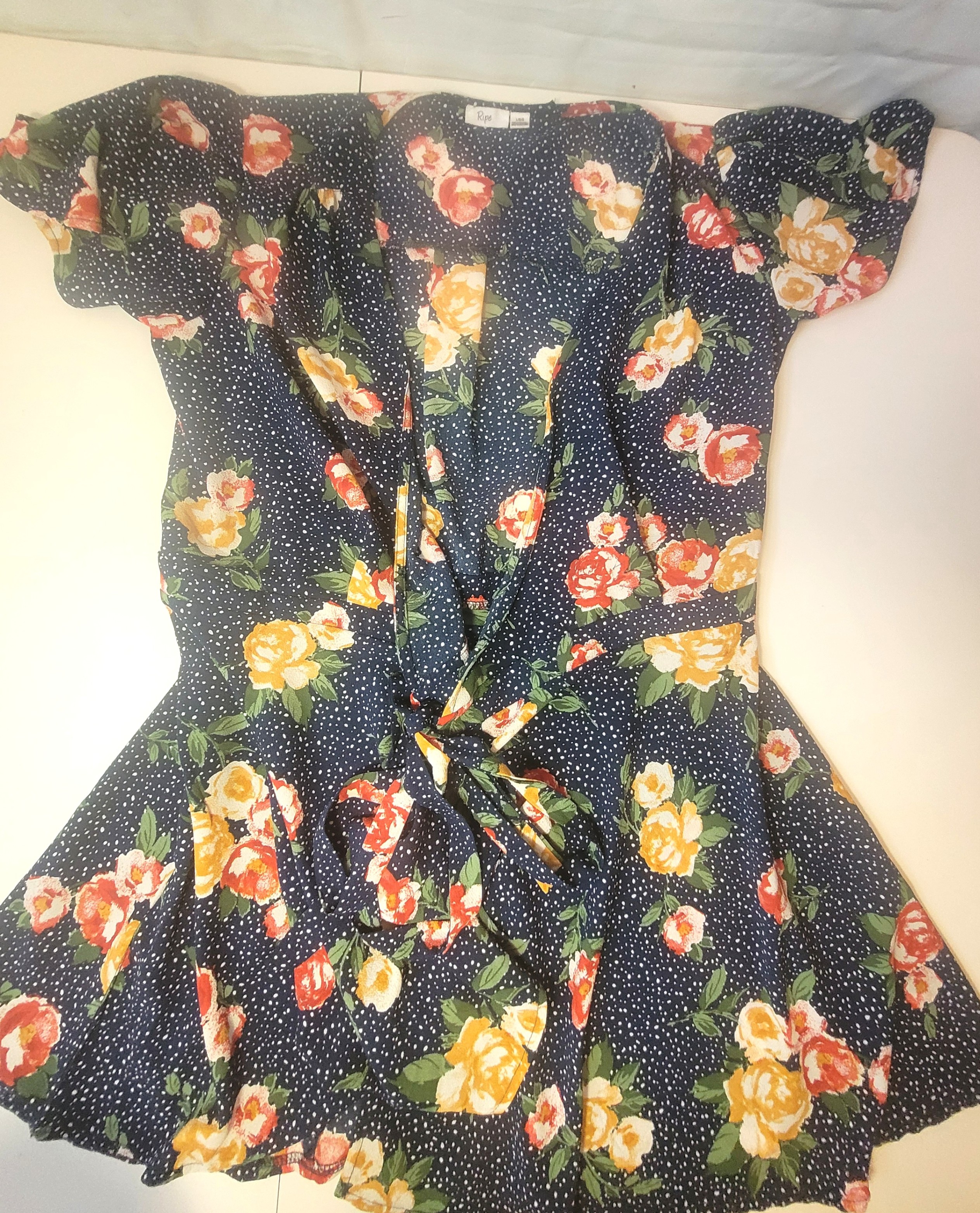 Ripe Maternity short sleeve wrap top featuring a navy blue polka - photo 5