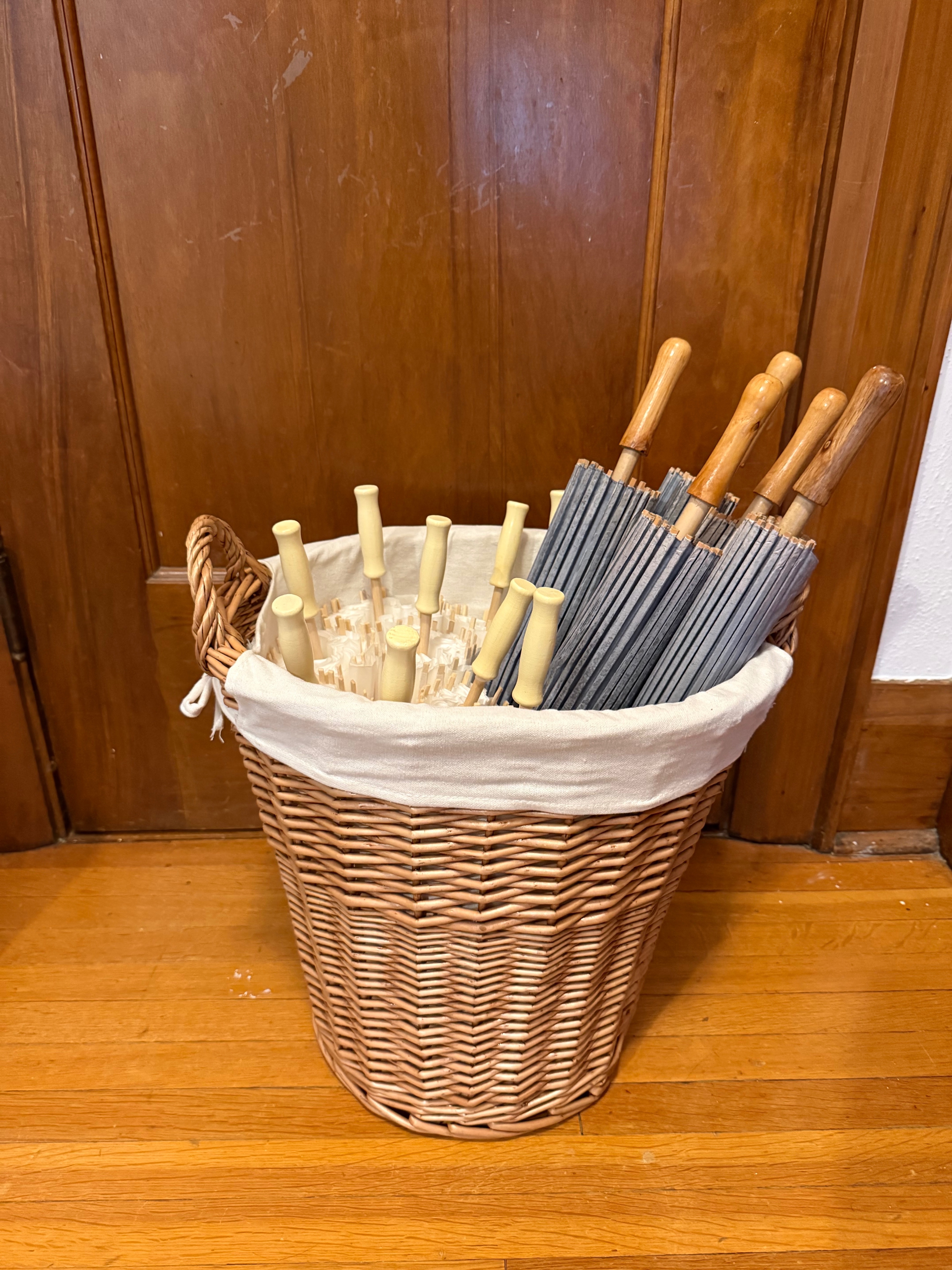 Set of Paper Umbrellas in Wicker Basket