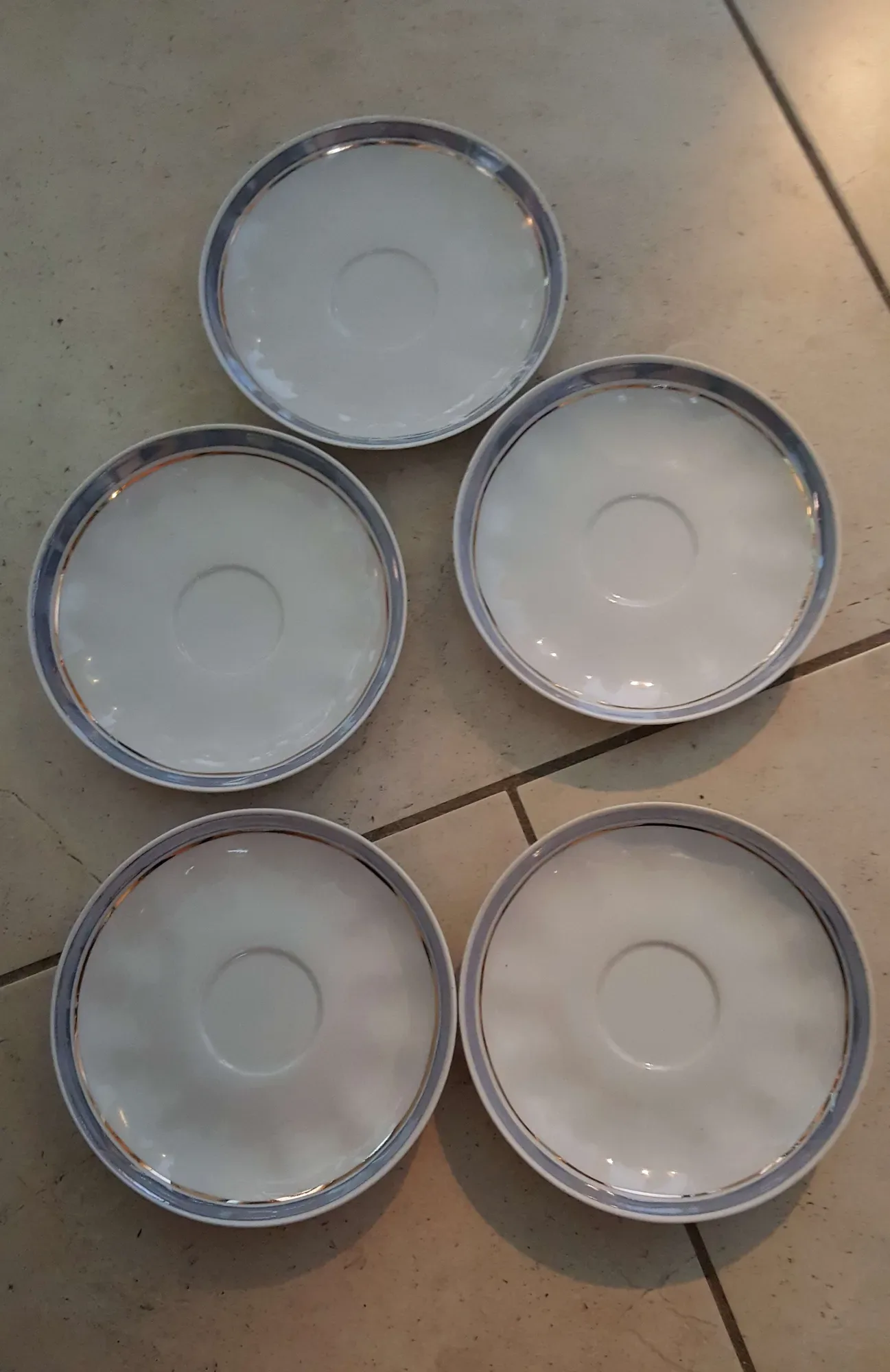 Porcelain Saucers -- Cute wee silver-rimmed plates