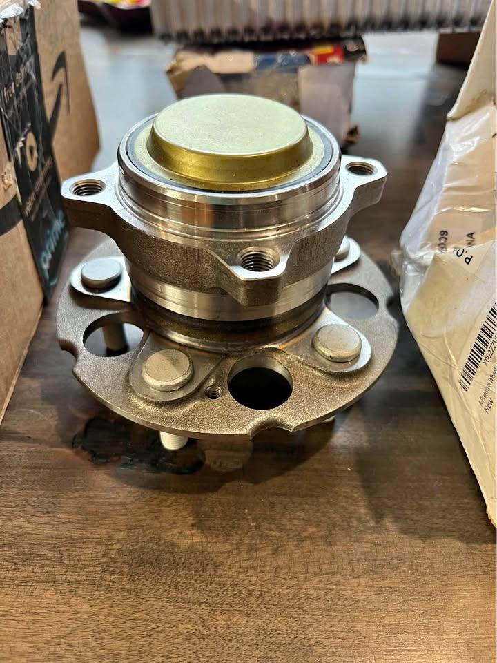 Complete wheel bearing and hub assembly