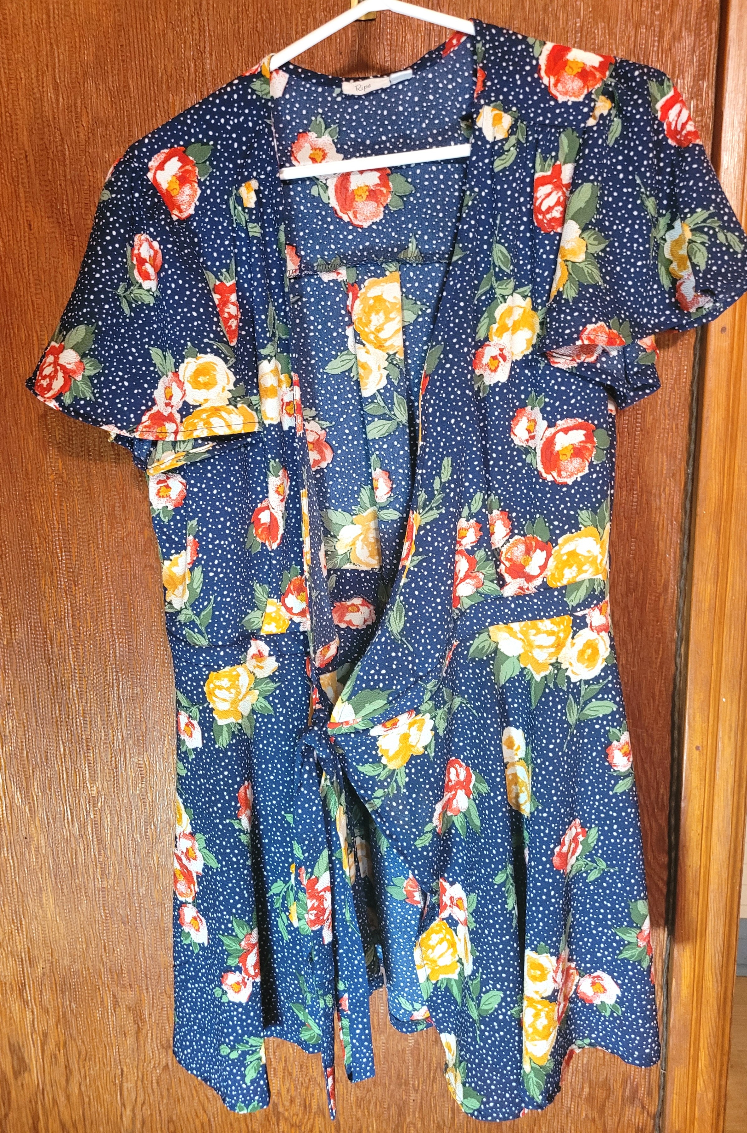 Ripe Maternity short sleeve wrap top featuring a navy blue polka - photo 2