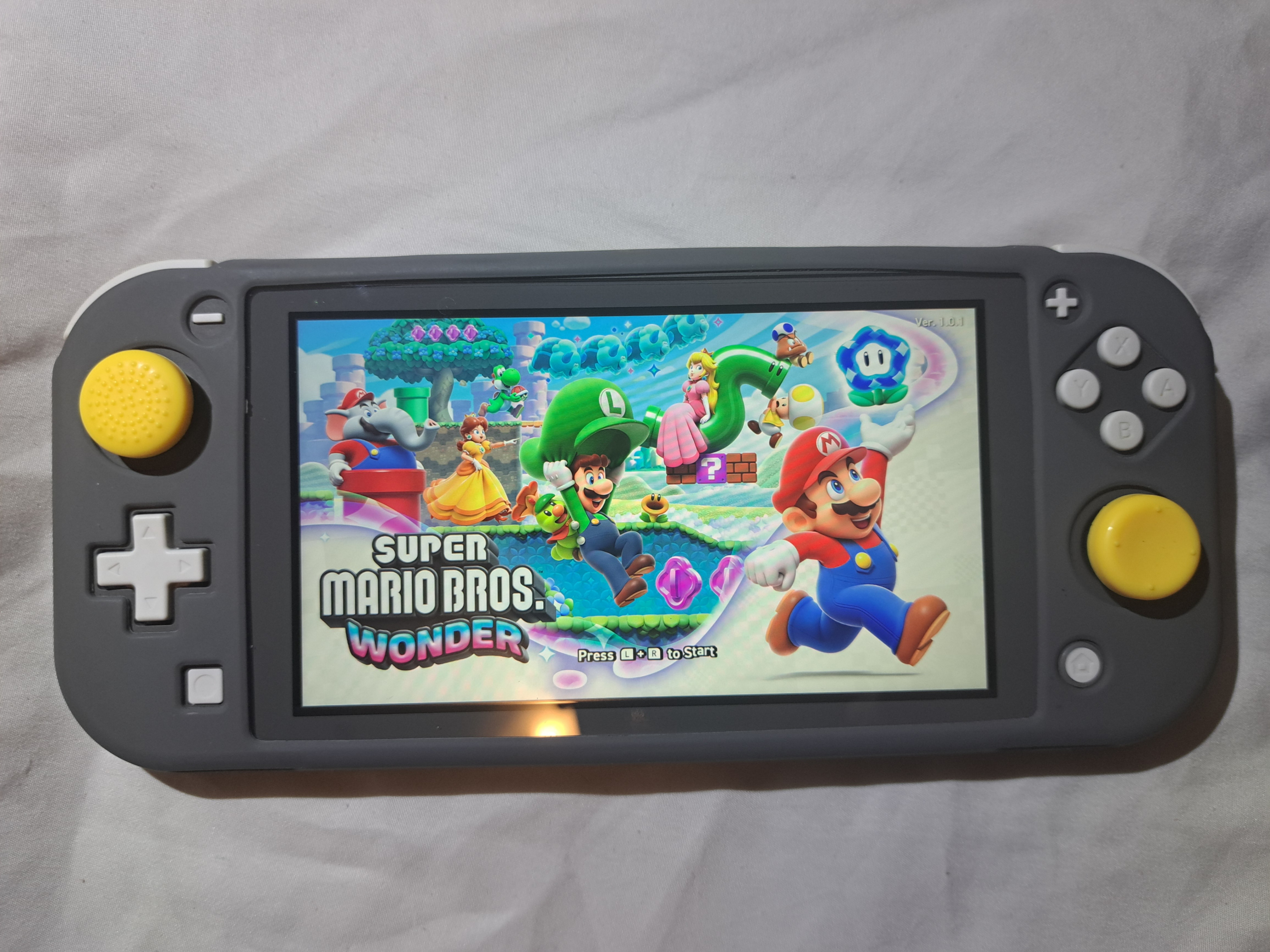 Nintendo Switch Lite (Grey) + 15 Games - photo 2