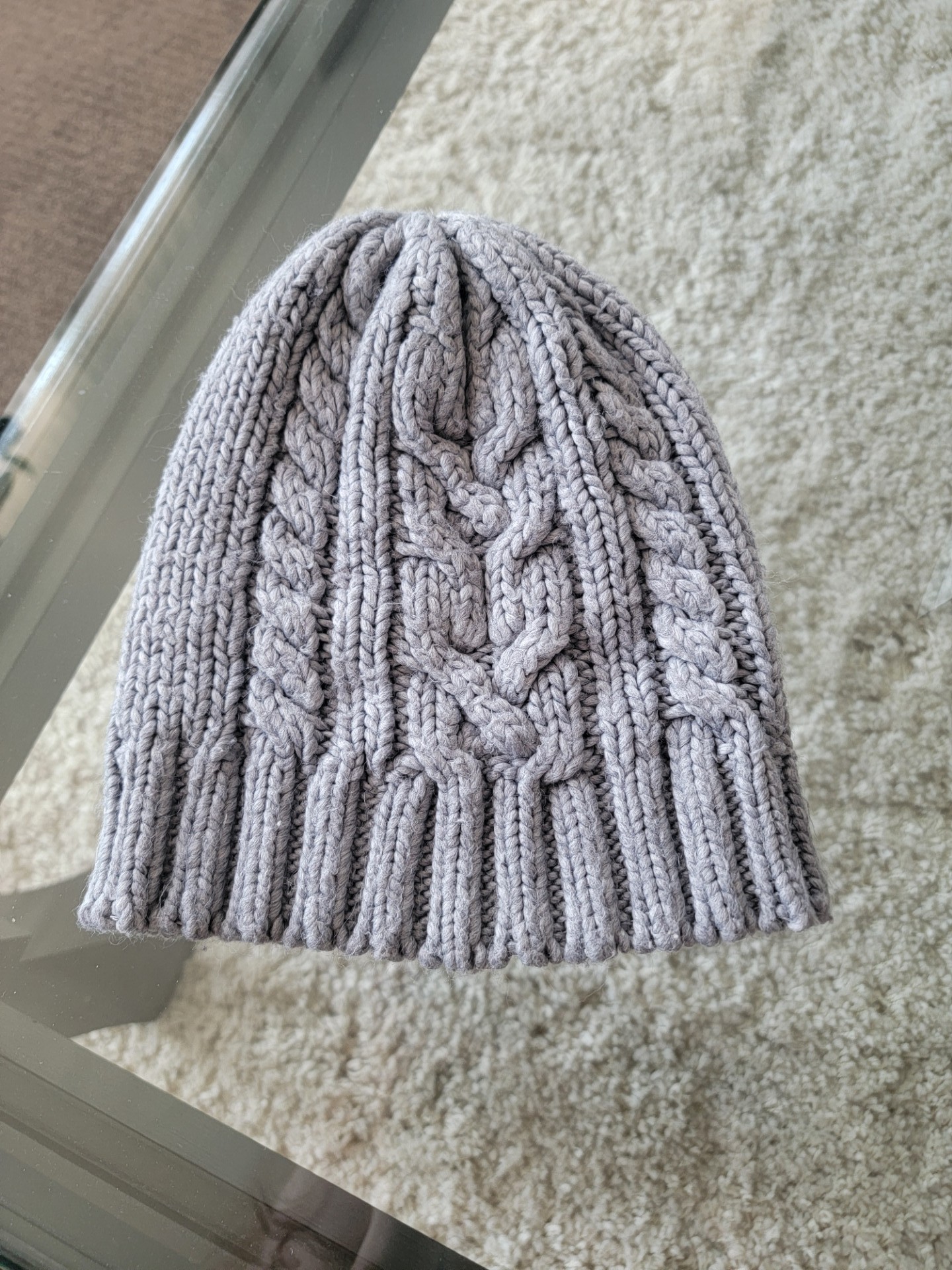 Age 10-18, can fit small adult knit hat