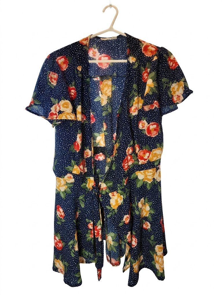 Ripe Maternity short sleeve wrap top featuring a navy blue polka
