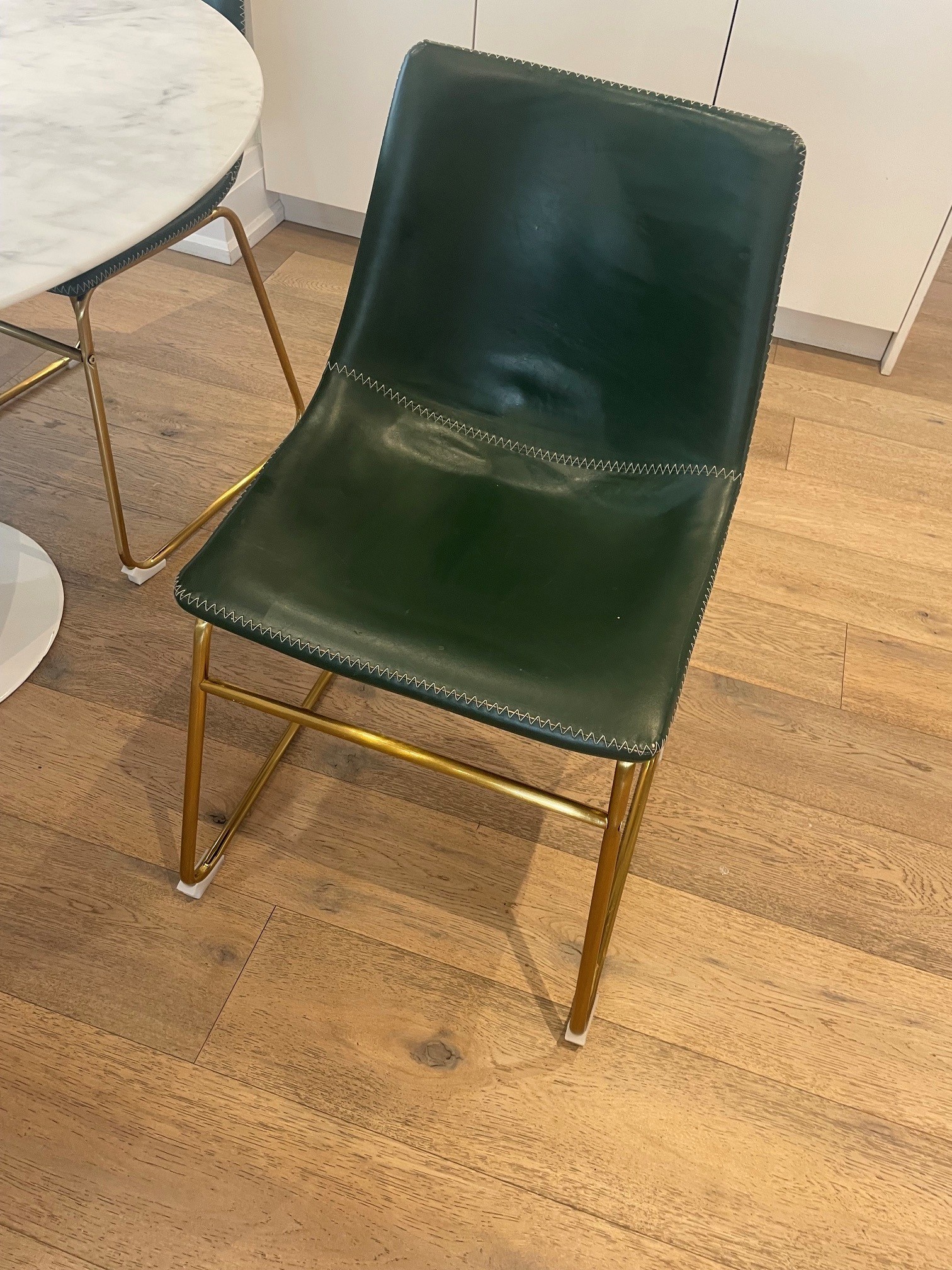 4 dark green leather dining chairs from West Elm - photo 2