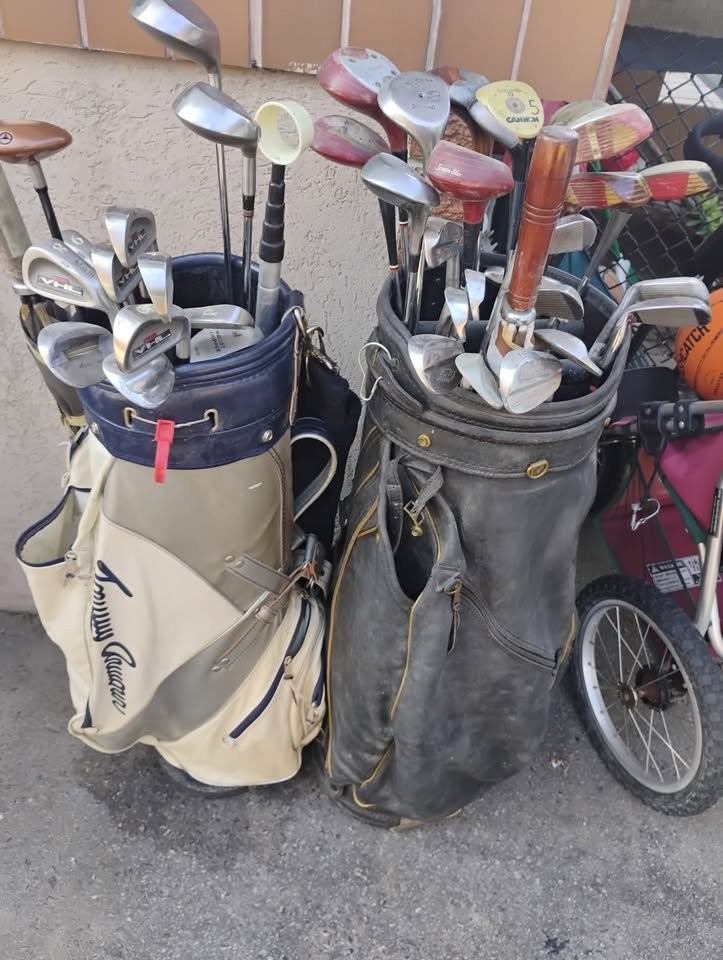 Two Sets of Golf Clubs and Golf Bags.
