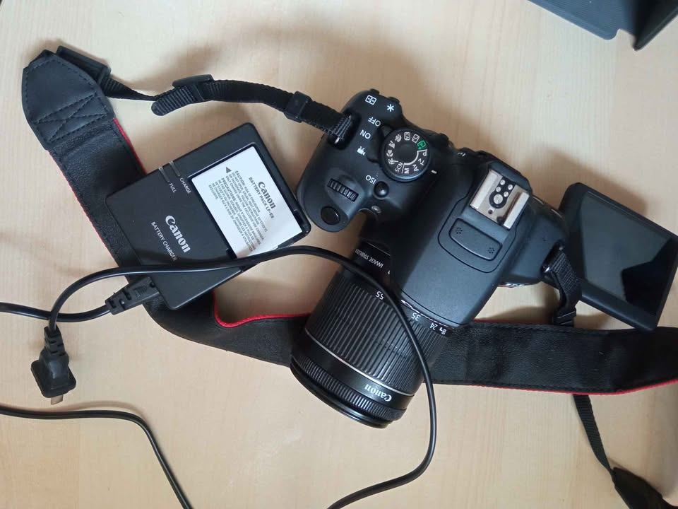 Canon EOS Rebel T5i + 18-55mm STM