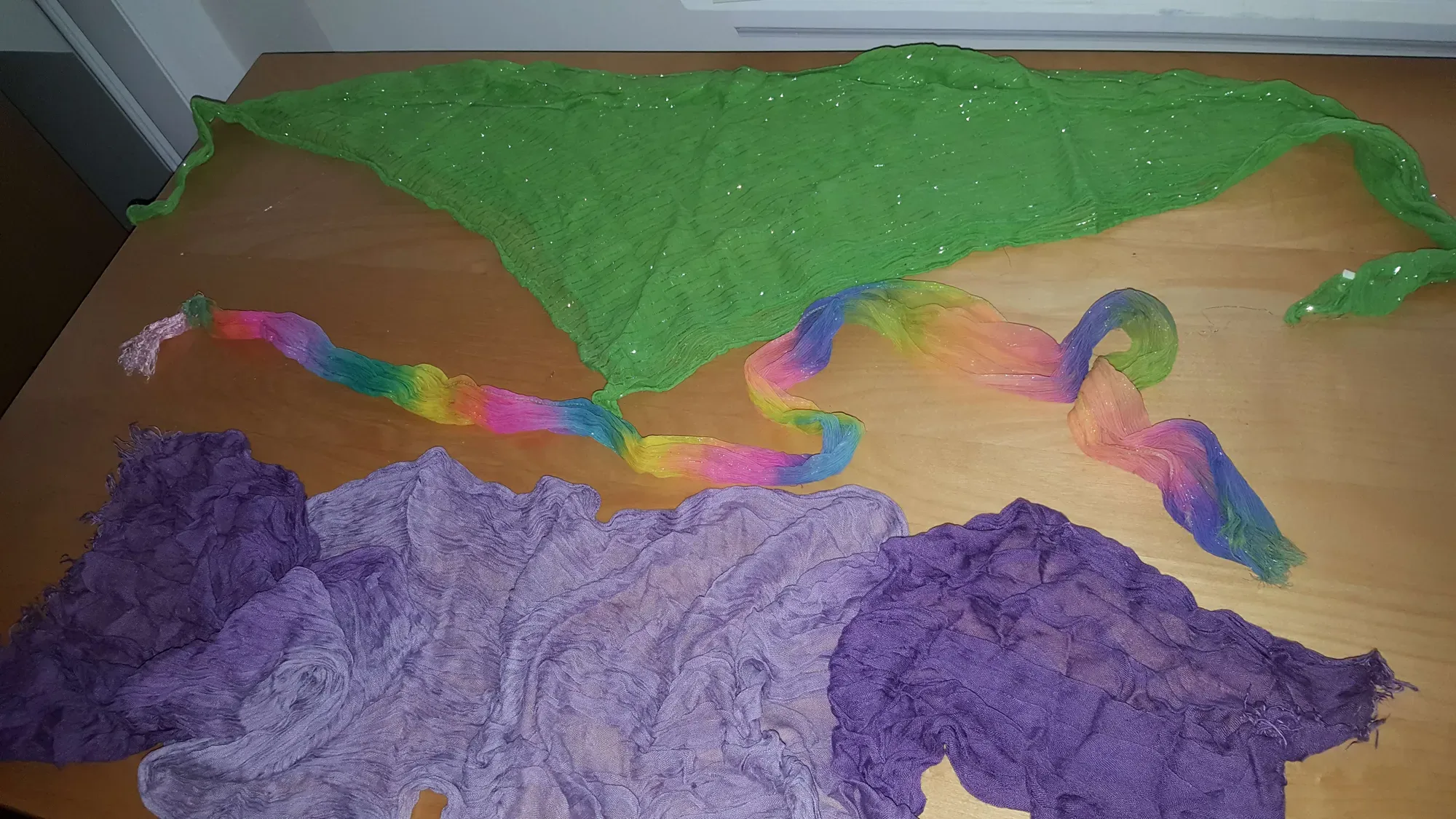 3 scarves -- green w silver, rainbow, & shades of purple