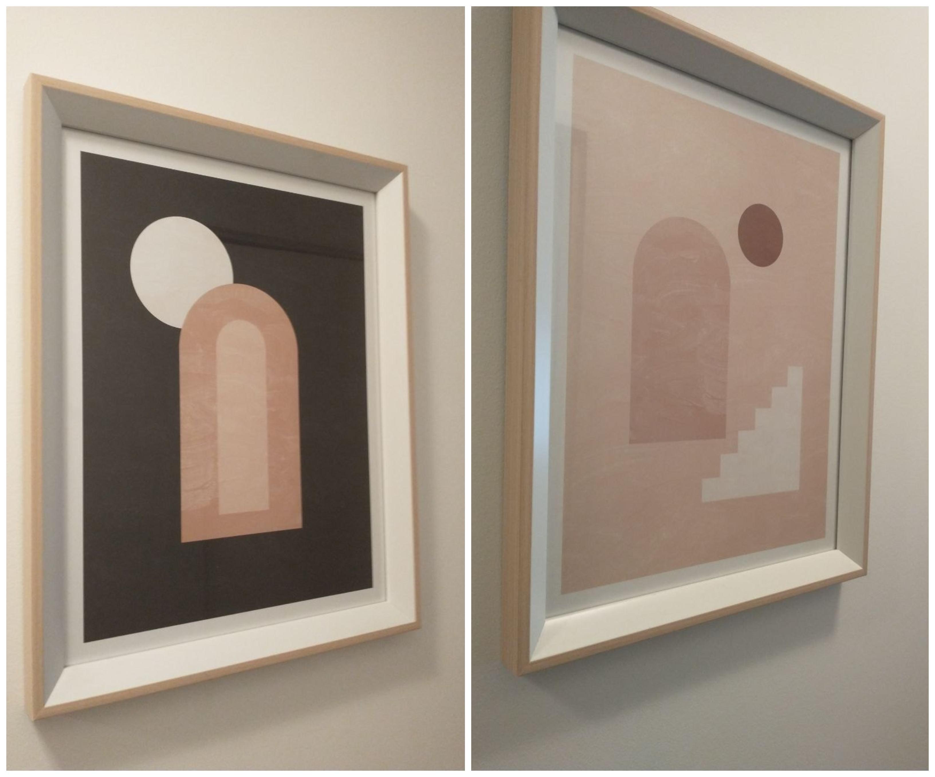 Two framed geometric art prints