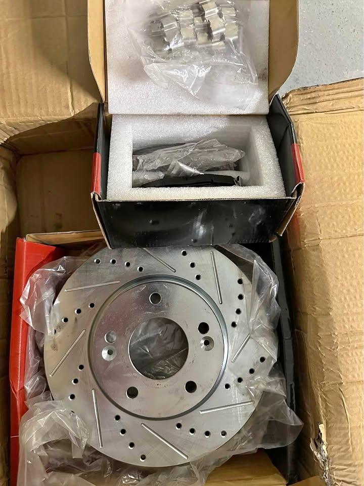 Drilled and Slotted Brake Rotors with Hardware