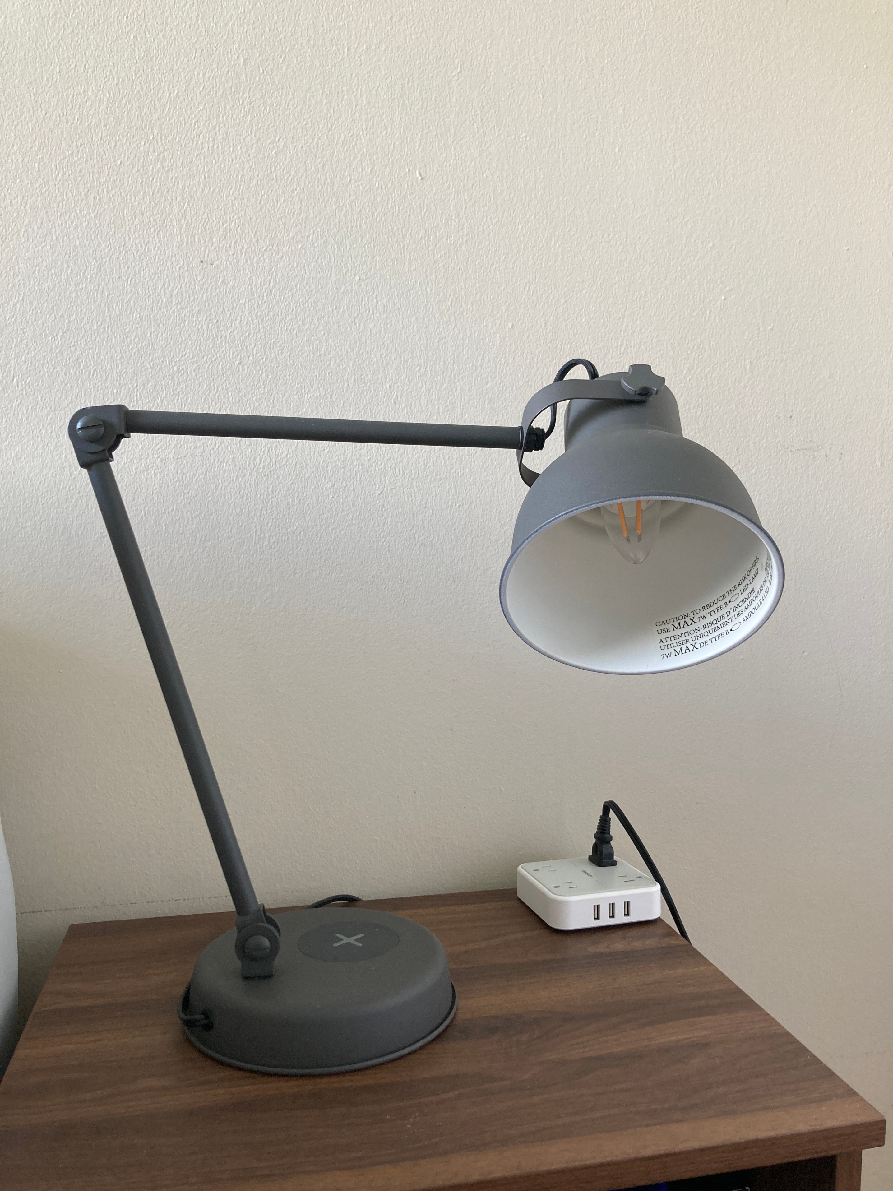 IKEA HEKTAR desk lamp with wireless charging and a bulb