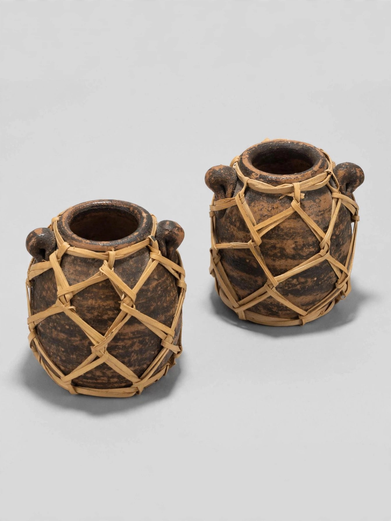 Pair Rustic Pottery Jars Woven Wicker Casing Vases