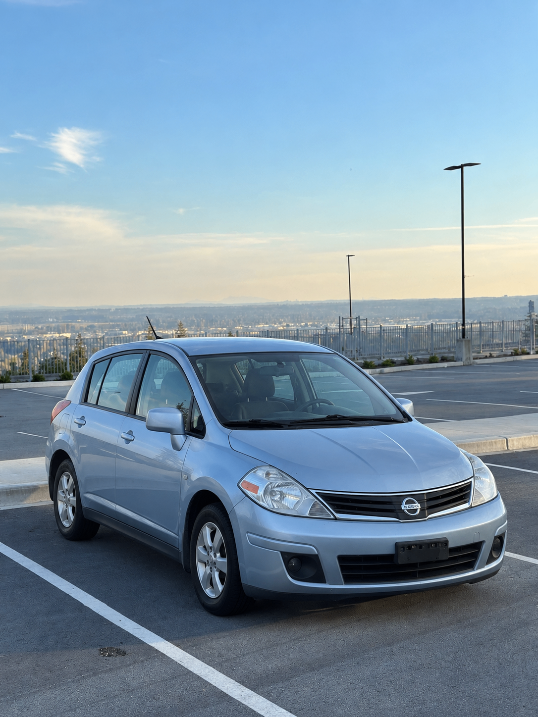 2012 Nissan Versa Hatchback with barely used Snow Tires