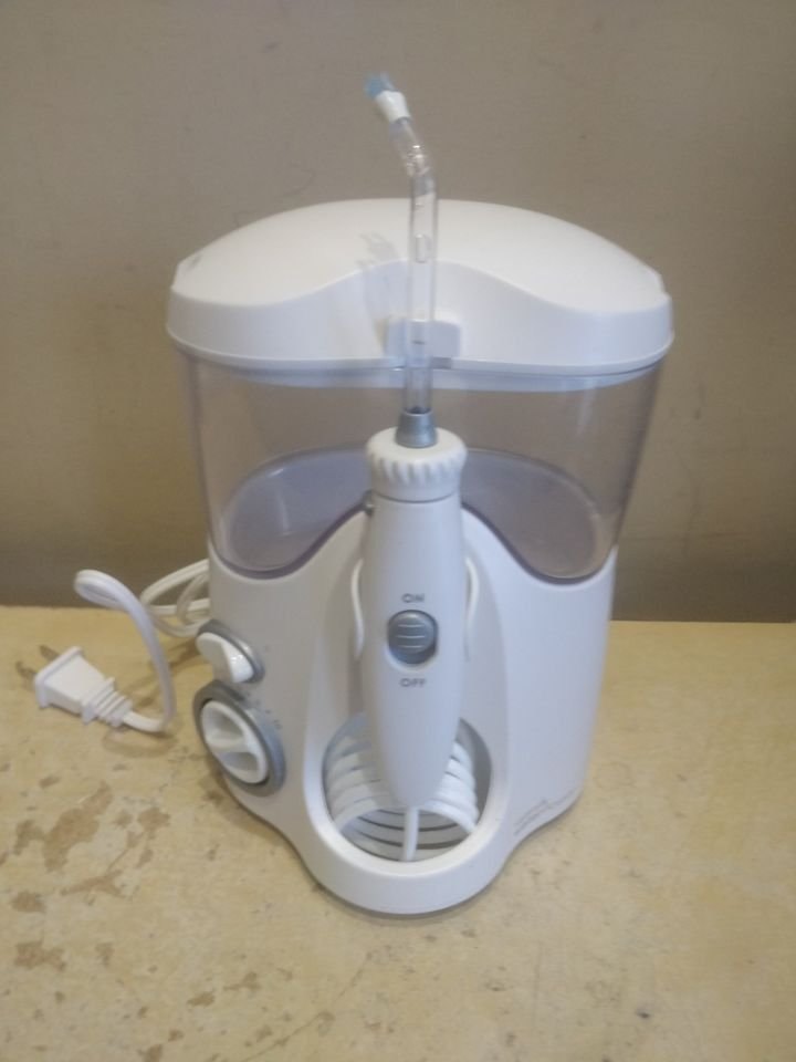 Ultra Water Flosser wp-100, with brand new replacement kit