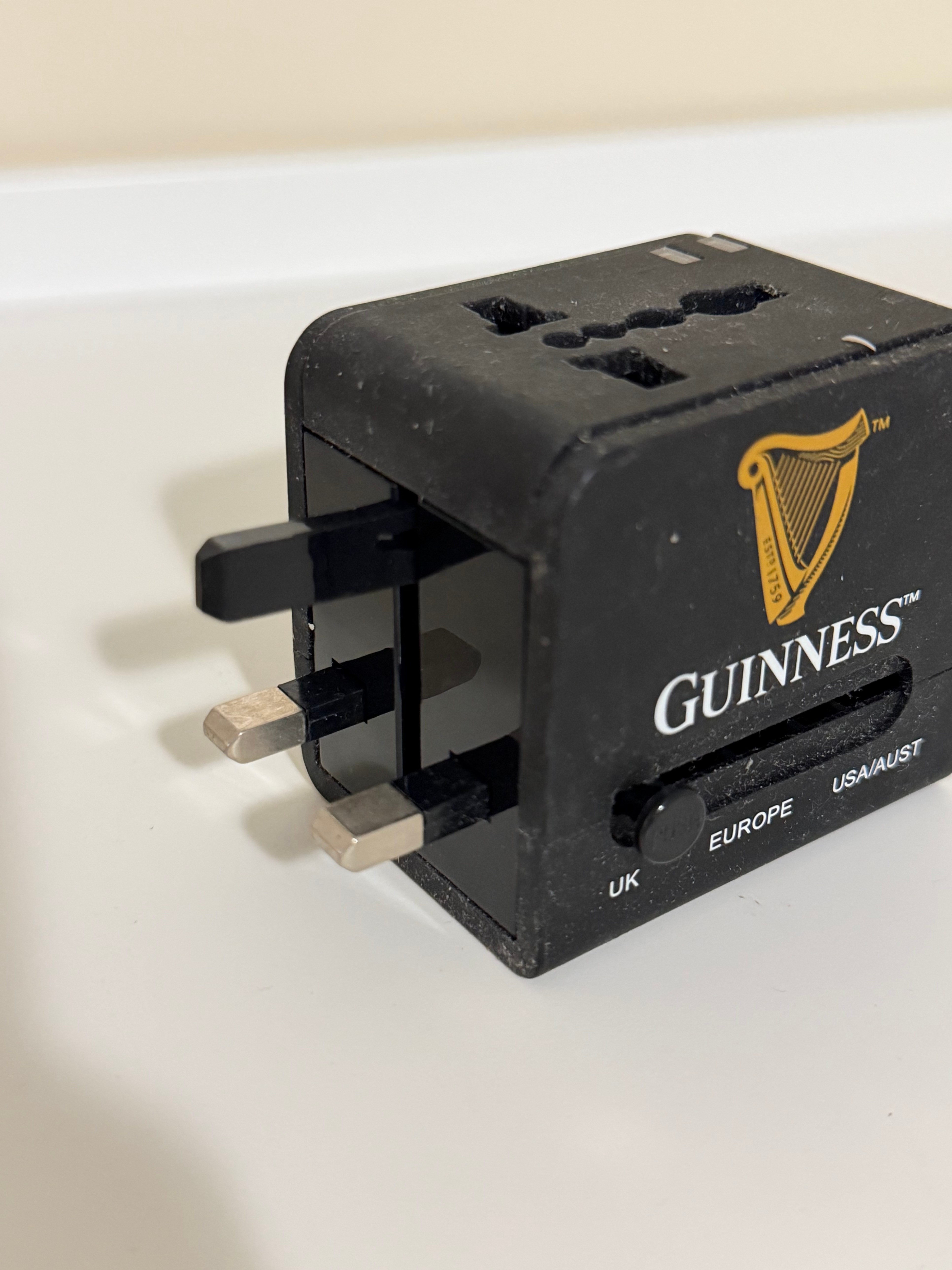 Guinness Universal Travel Adapter with Dual USB Ports - photo 2