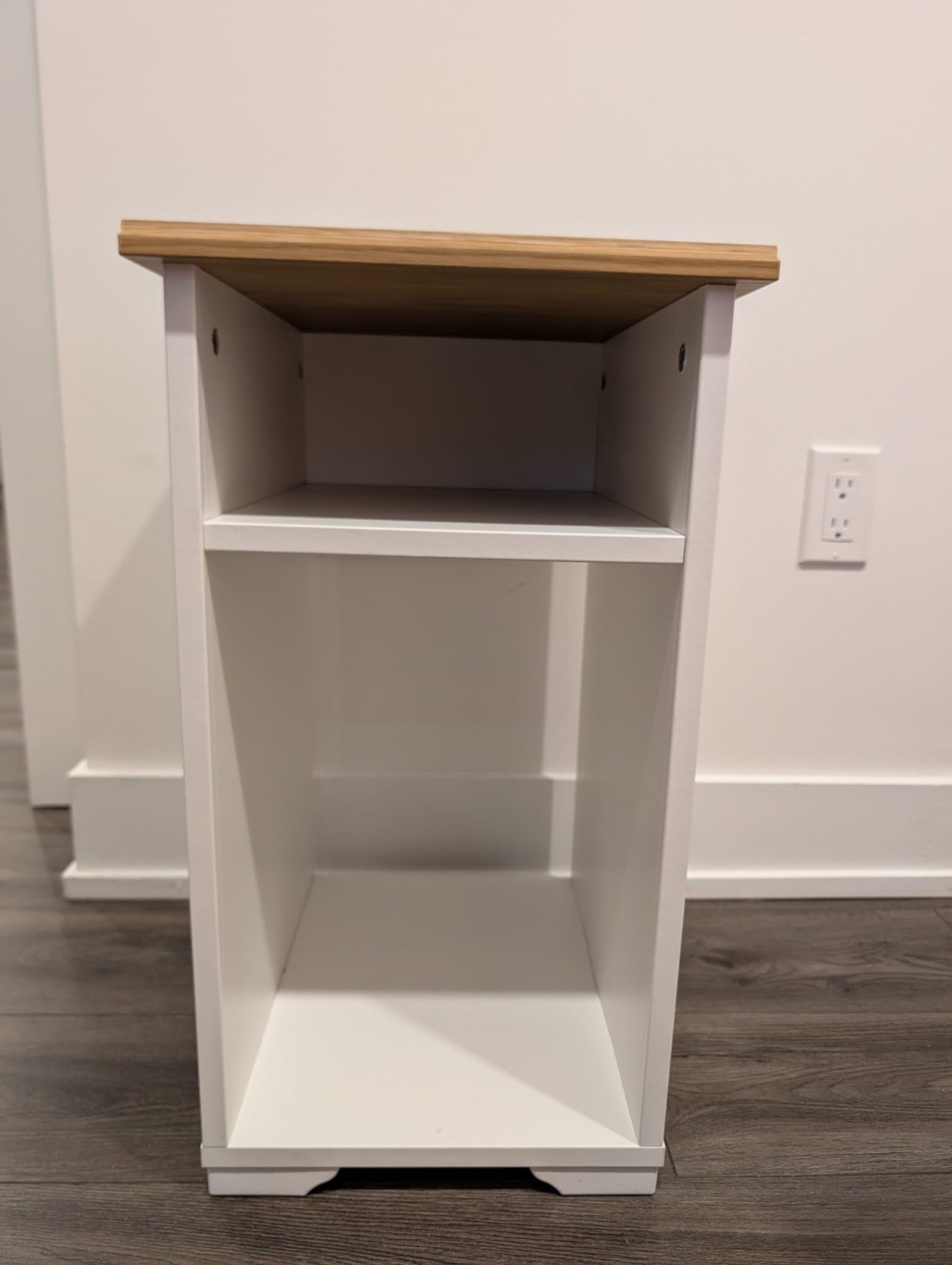 IKEA SKRUVBY side table in white with an oak-look top.