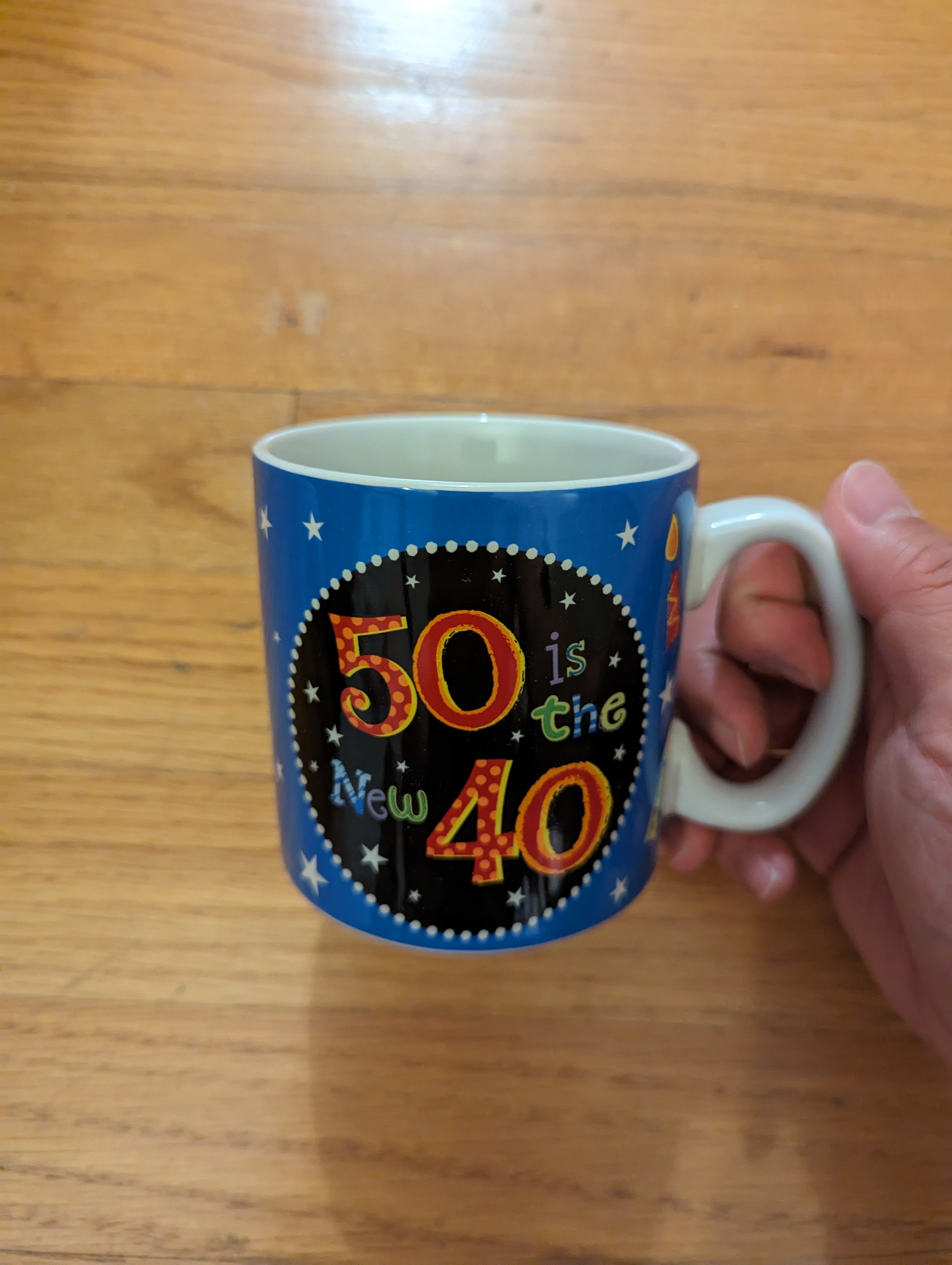 "50 is the new 40" ceramic mug. New in box.