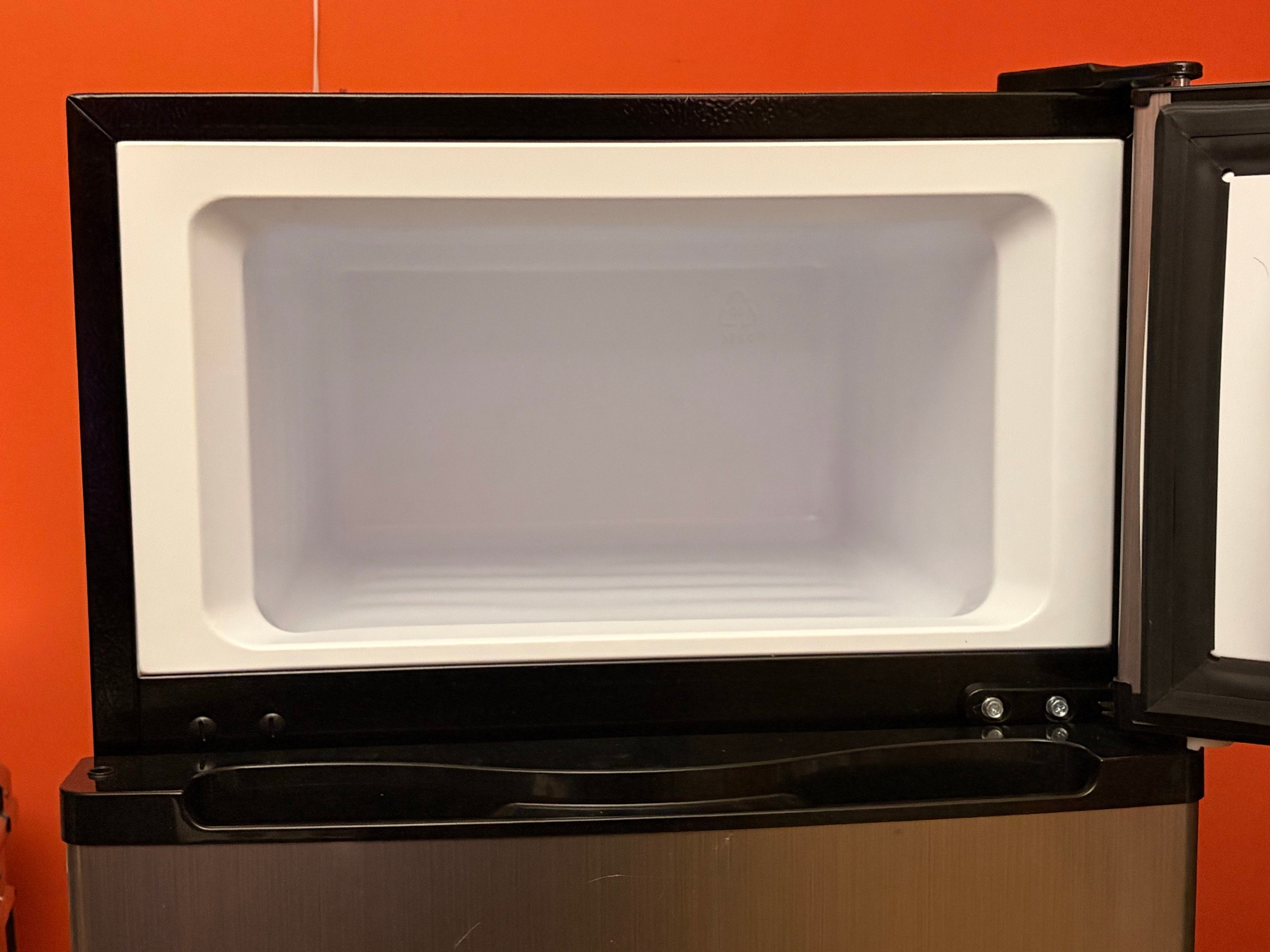 Insignia compact 2-door mini fridge w/ freezer (stainless steel) - photo 4