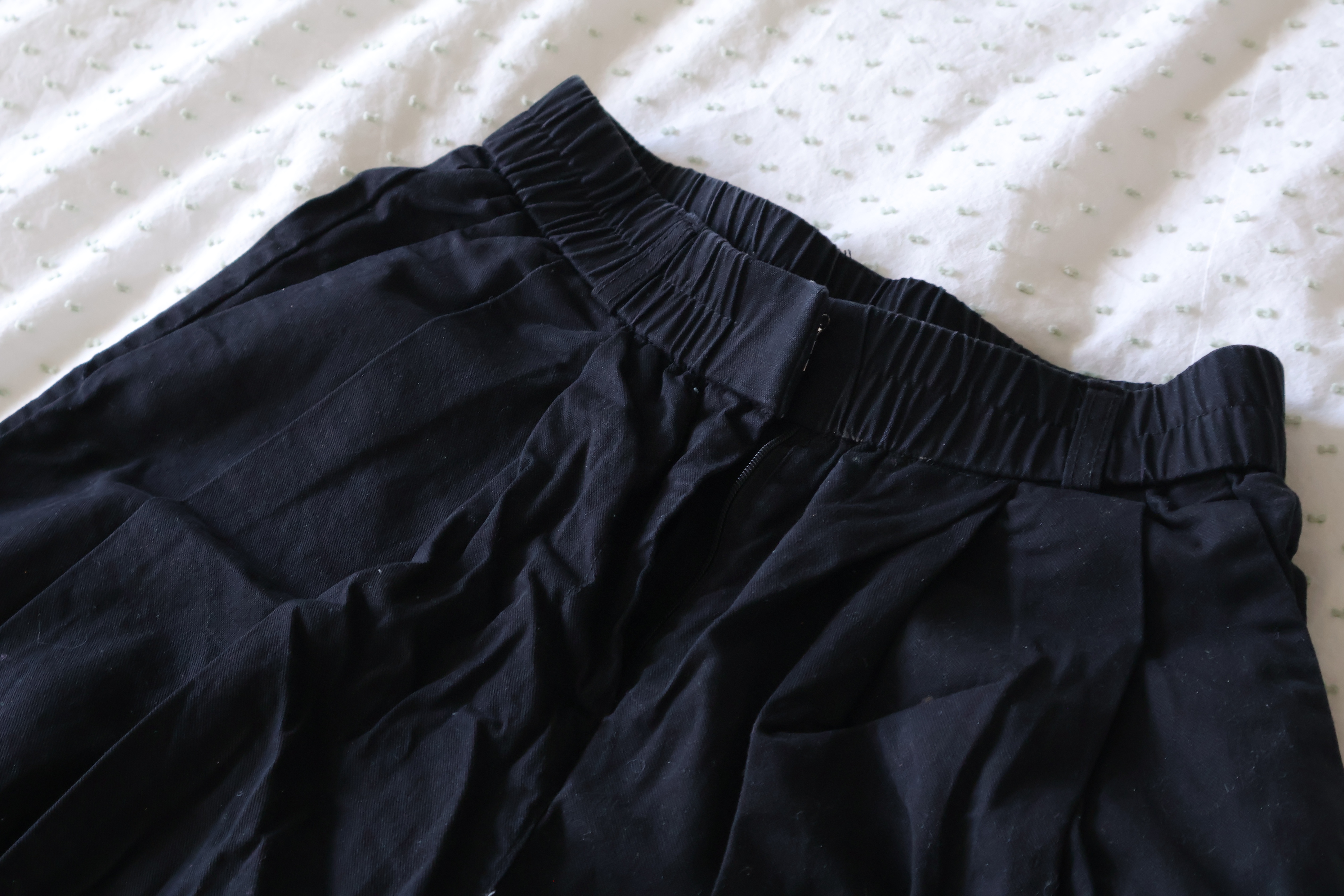 Black pleated pants