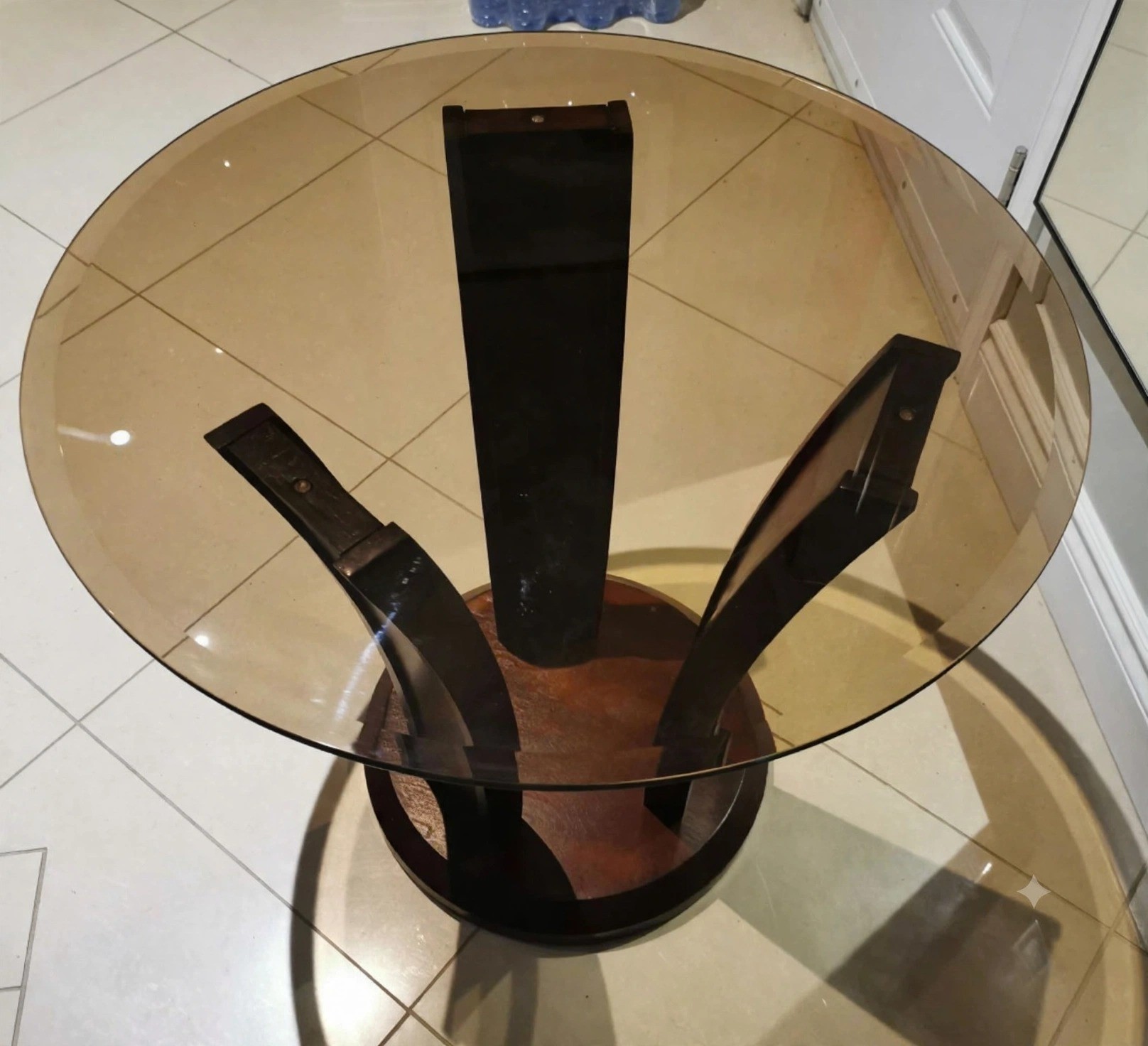 Round tinted glass coffee table, 32 in. dia. used,. leg is new