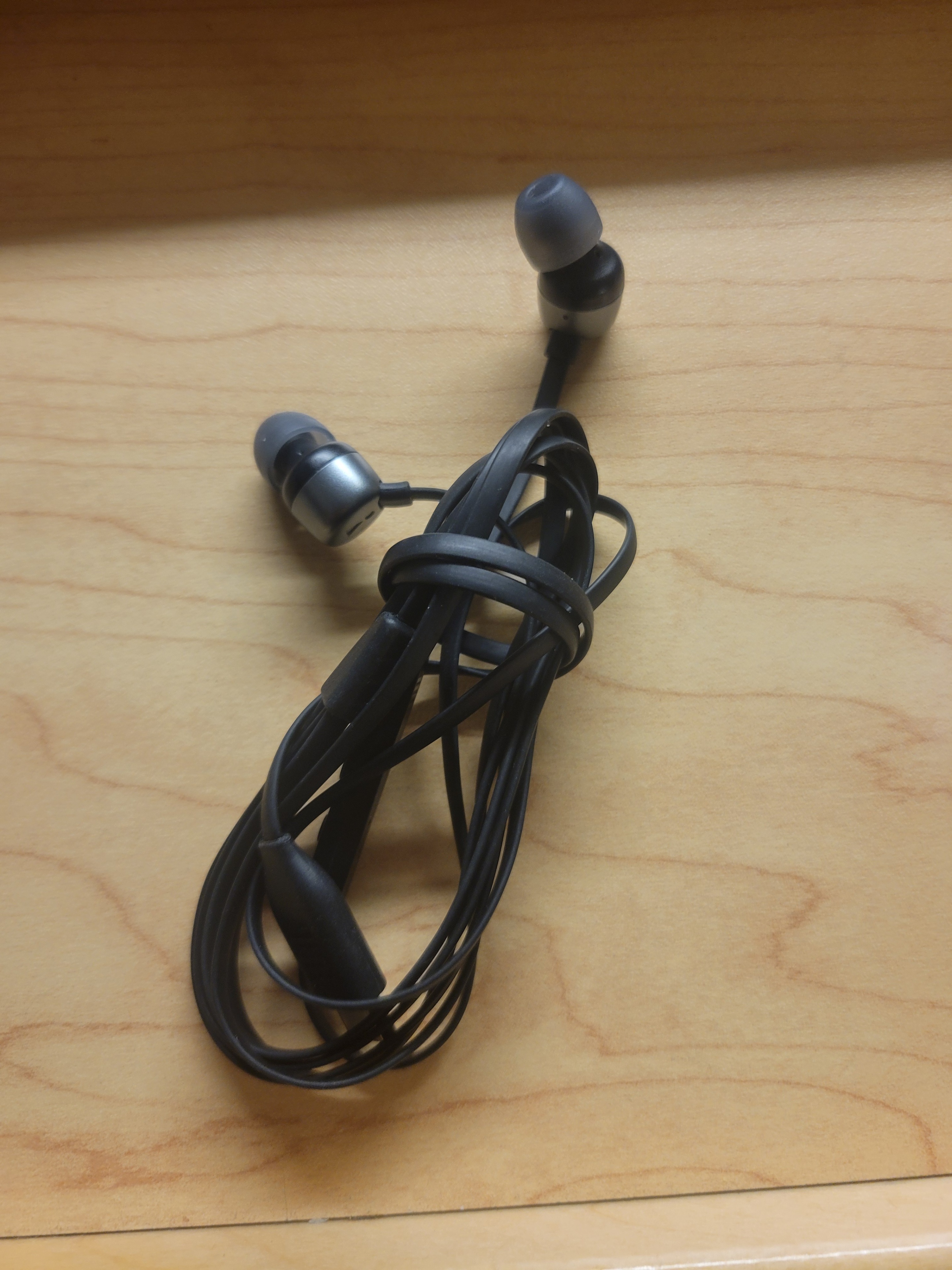 Two pairs of wired earbuds
