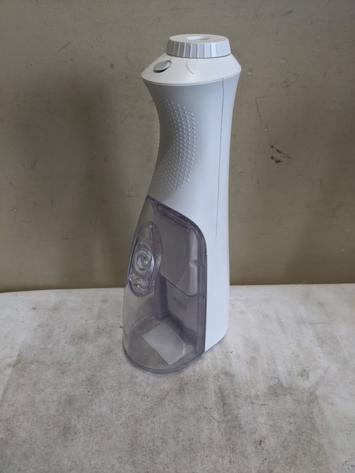 Waterpik Rechargeable Water Flosser with 5 NEW Flossing Tips - photo 4