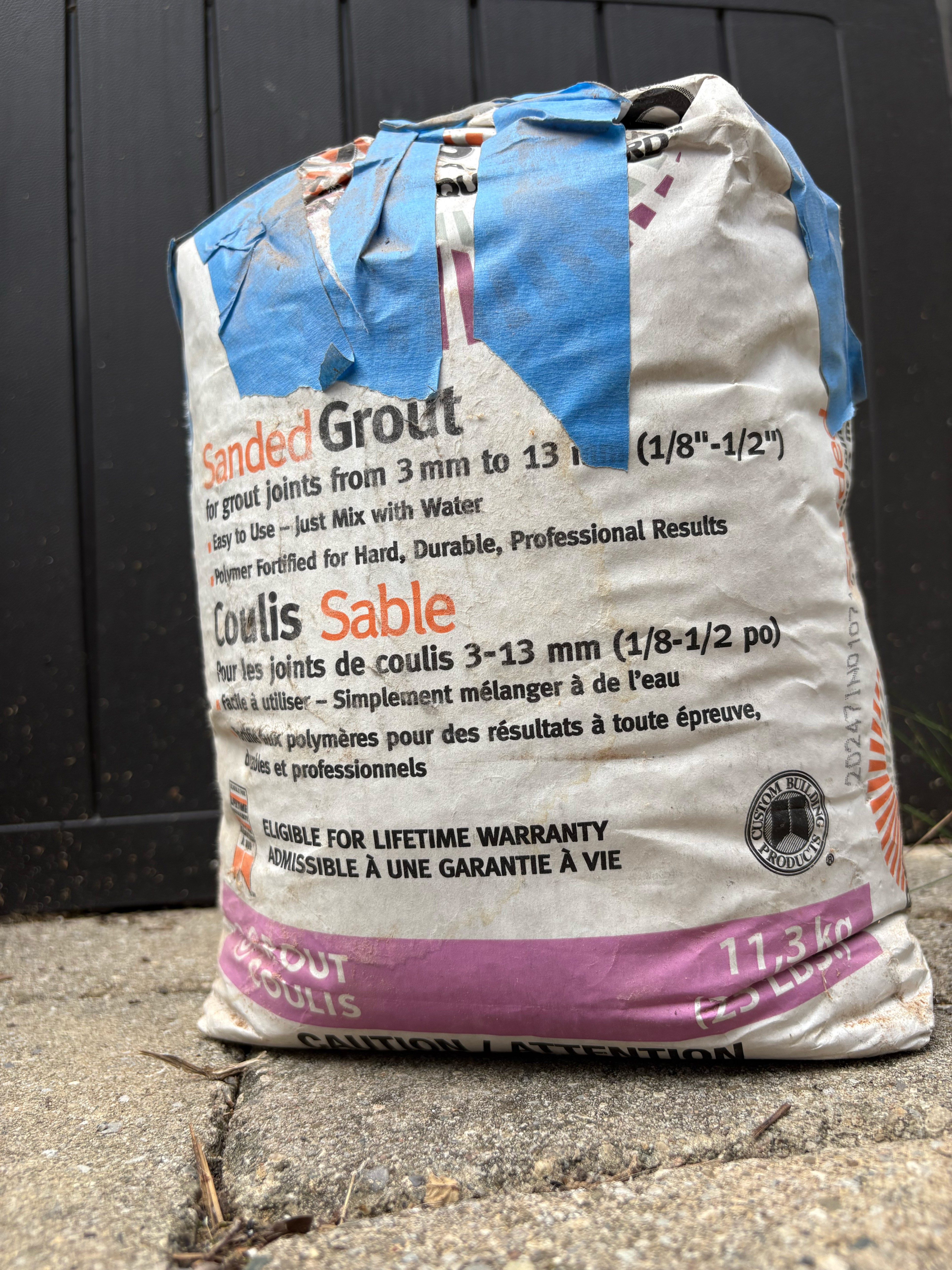 Polyblend grey sanded grout - open bag