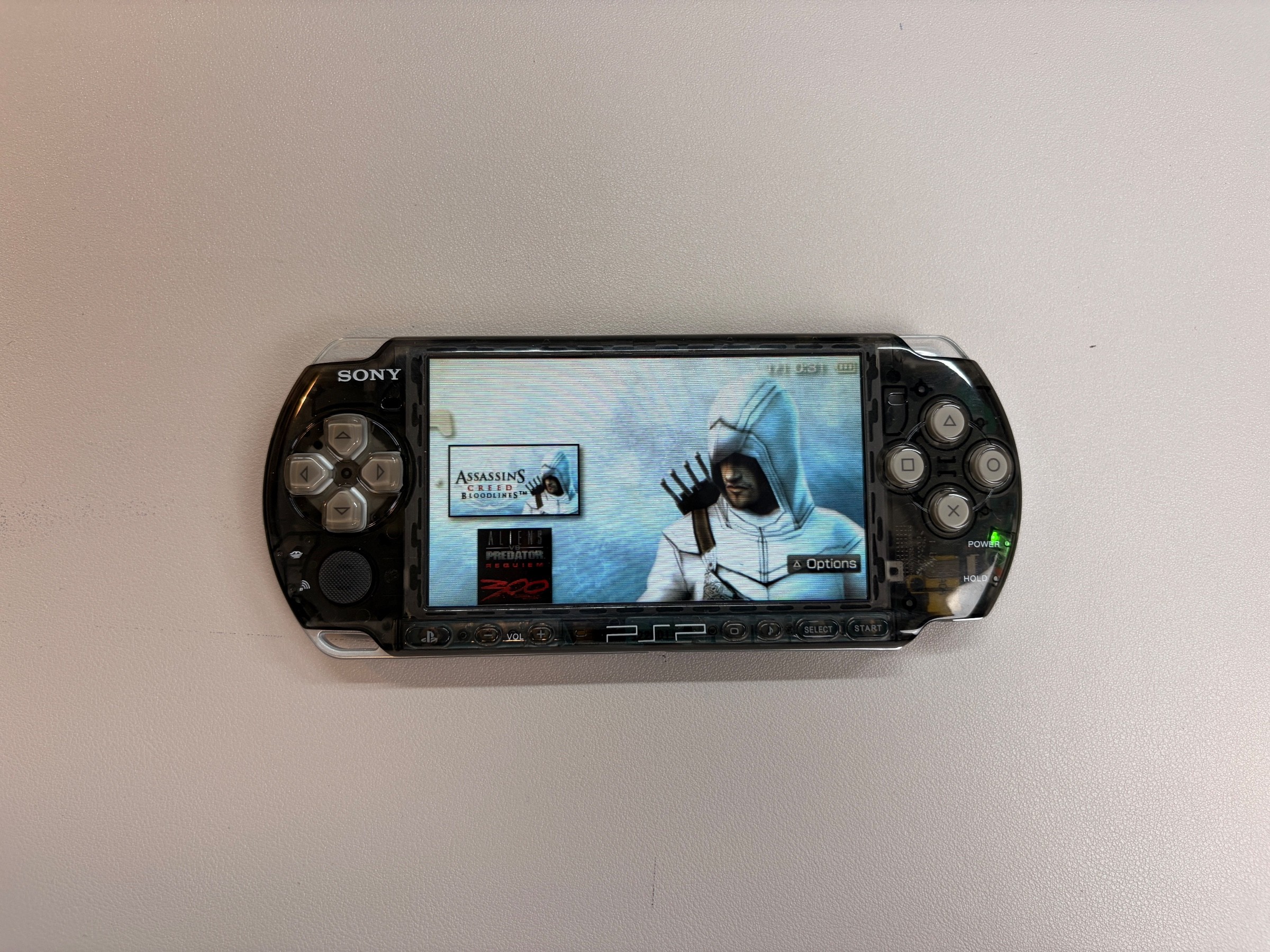 Sony PSP 3000 Handheld Game Console — Transparent Black
